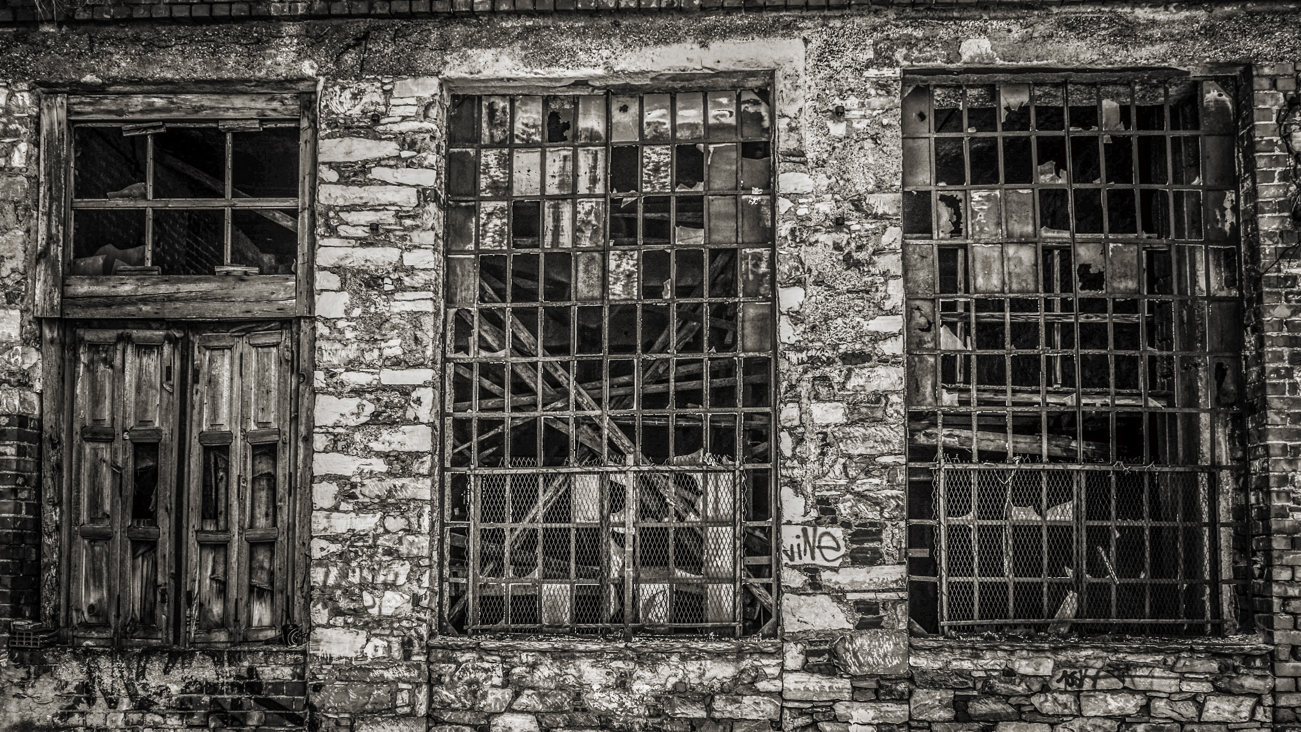 Free Stock Photo of Broken Glass Windows in Factory Ruins