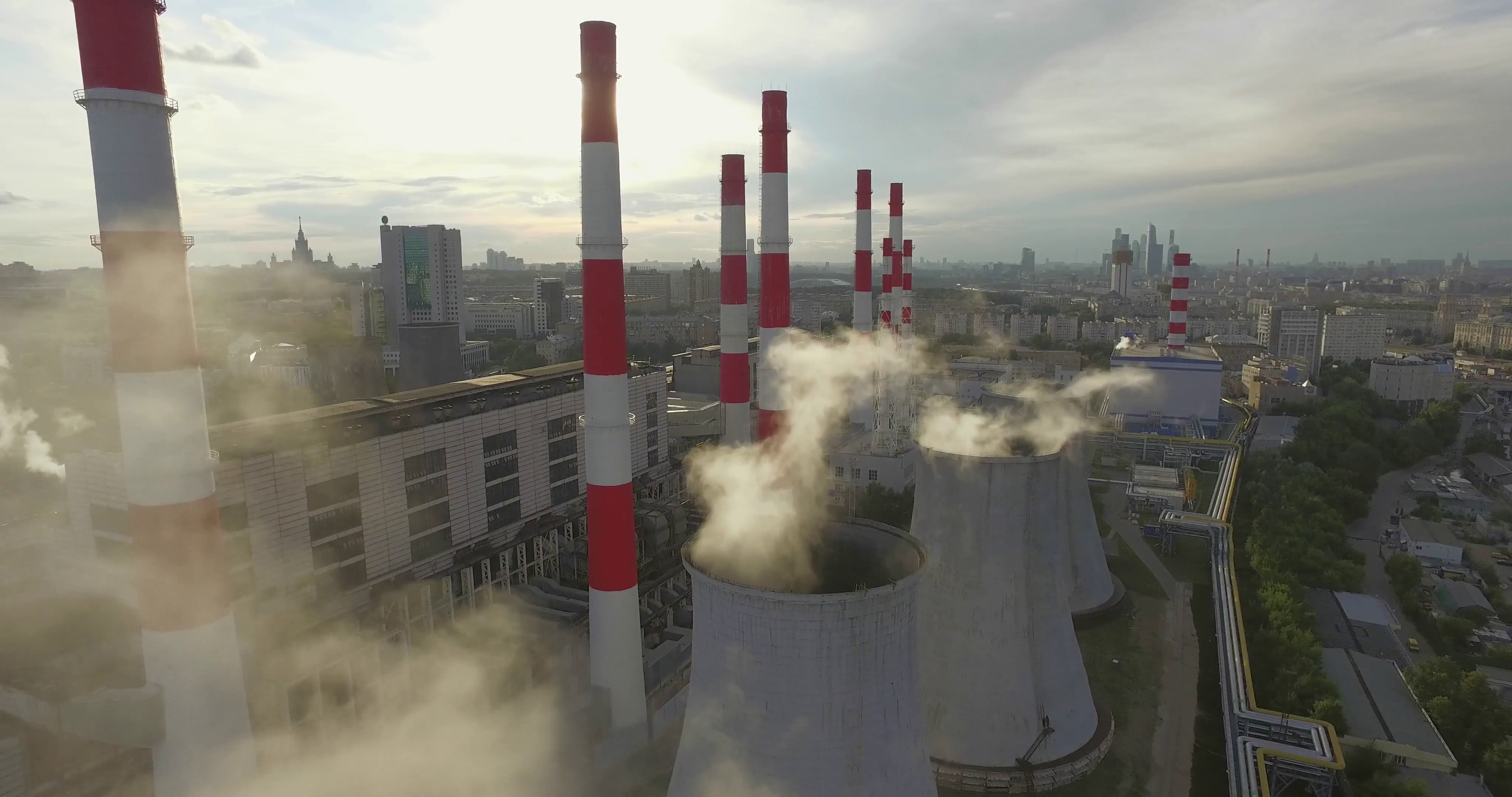 Aerial 4K: Pollution concept, Smoke or Steam from an Industrial ...