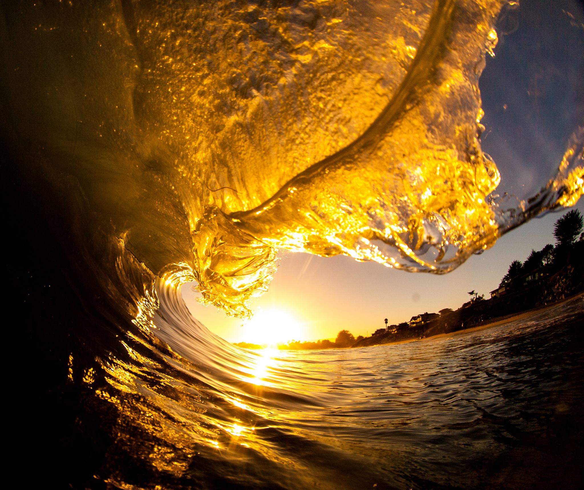 A view of the sunset from inside a wave | Capitola By The Sea