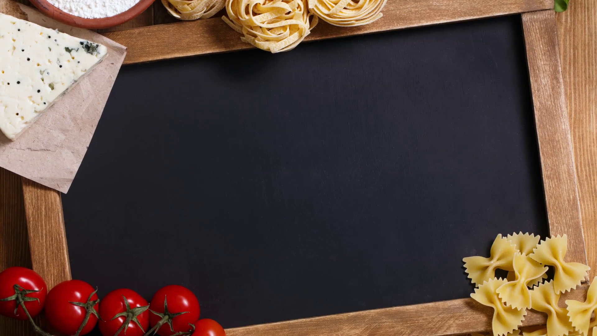 Italian food on vintage wood background, with chalkboard, with ...