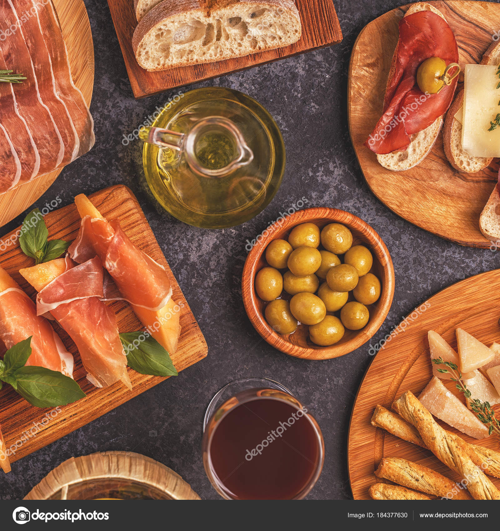 Italian food background with ham, cheese, olives. — Stock Photo ...