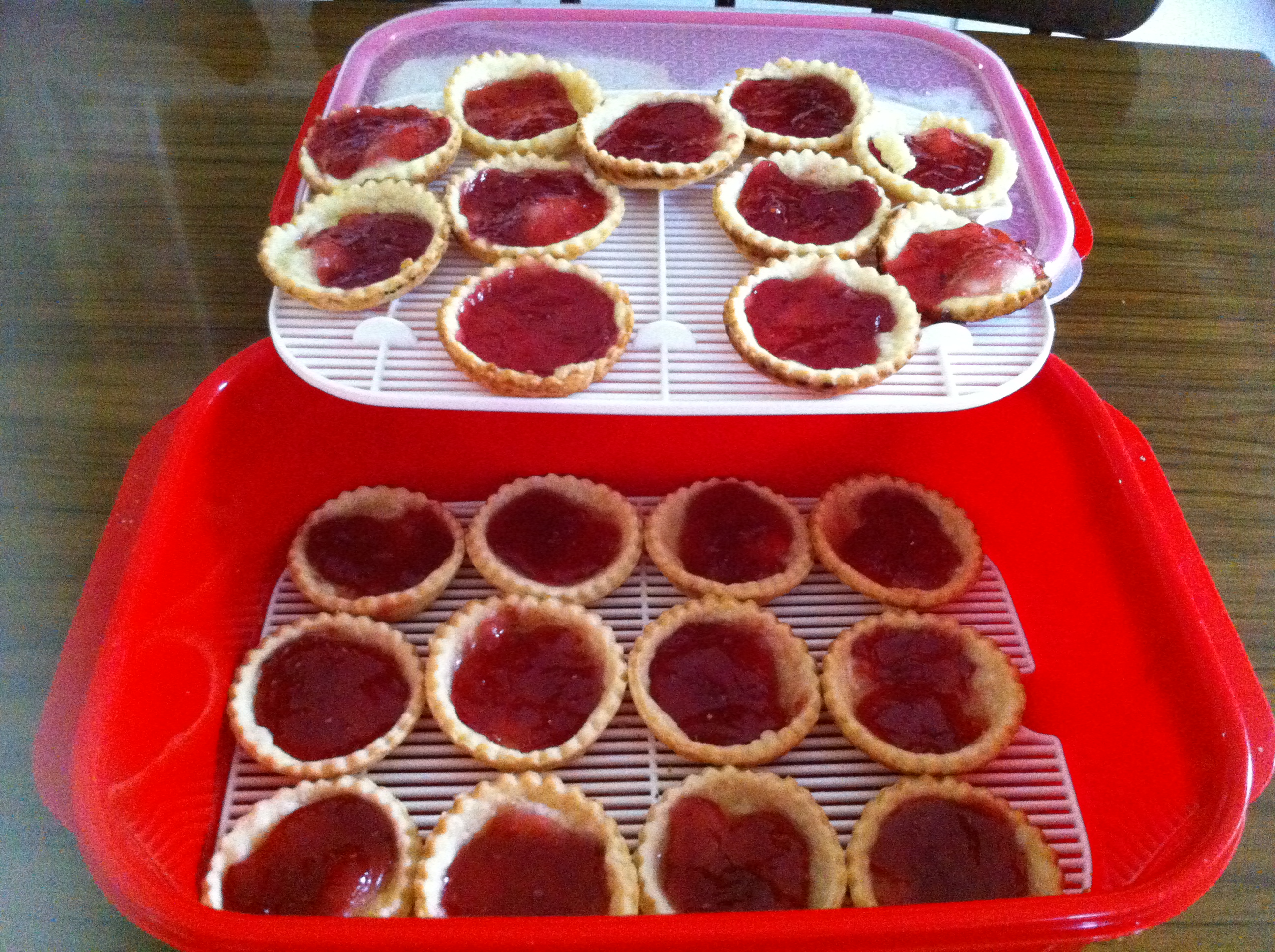 Jam tarts in container photo