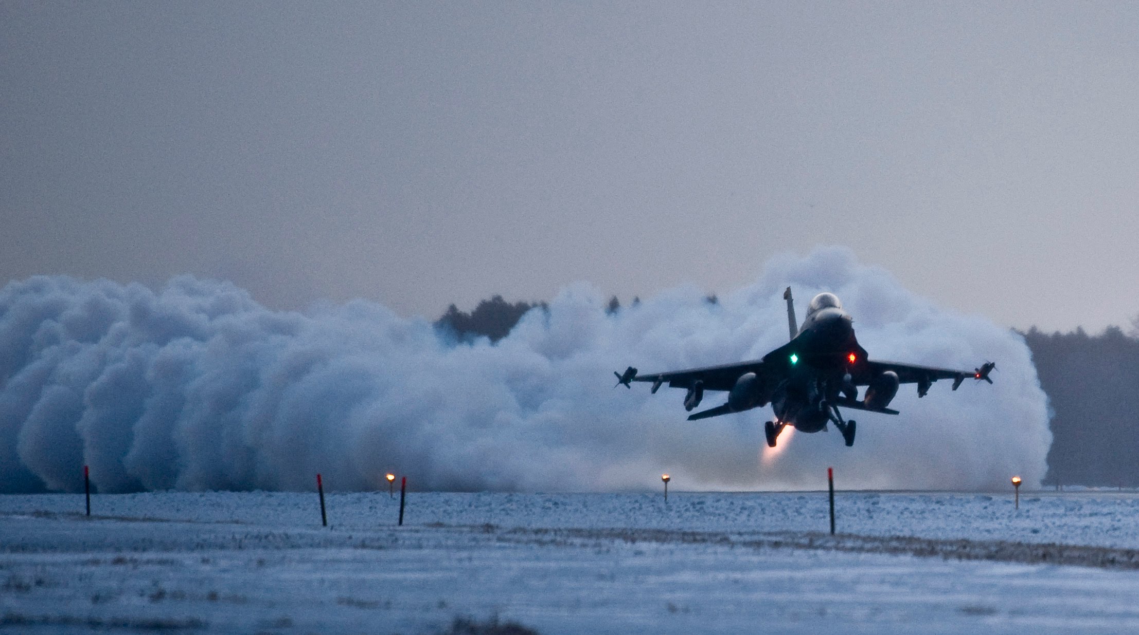 Military jet takeoff photo