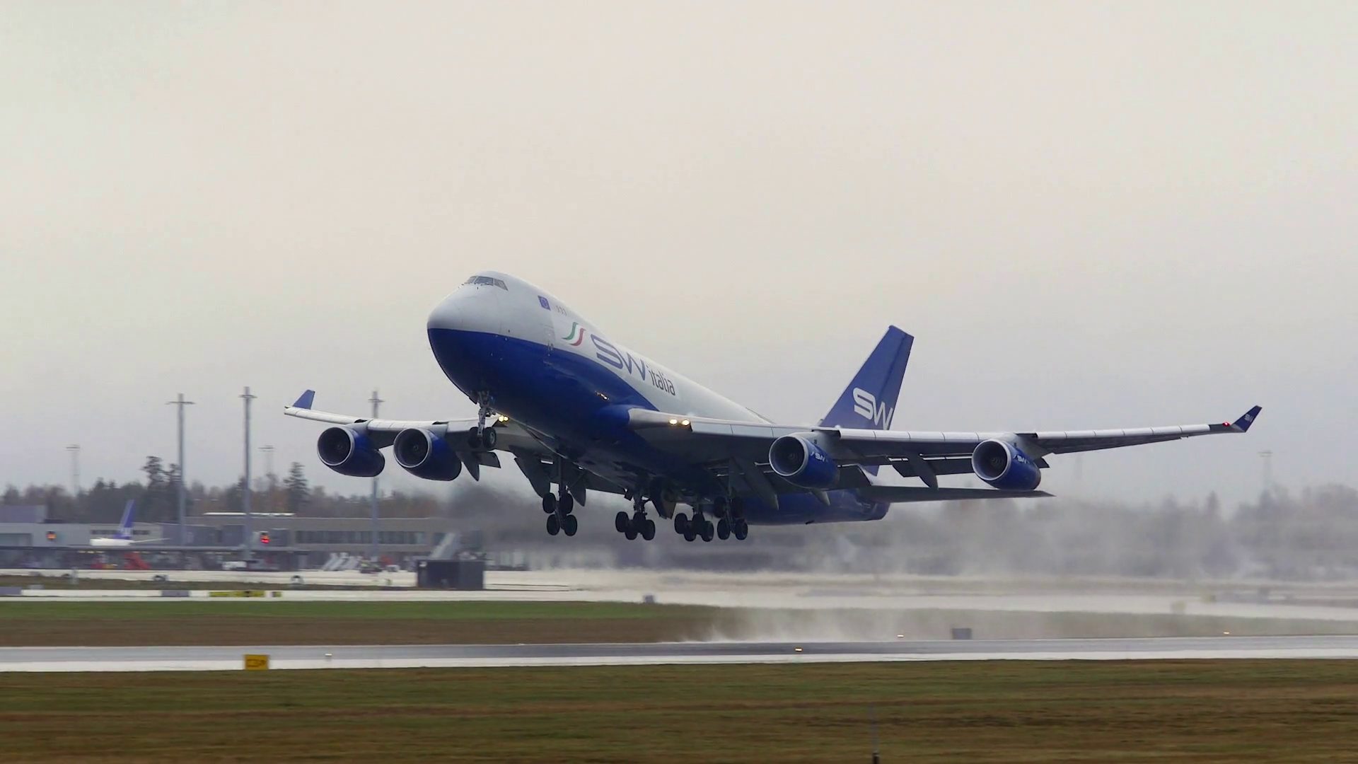 huge jumbo jet 747 takeoff wet moisture runway Stock Video Footage ...