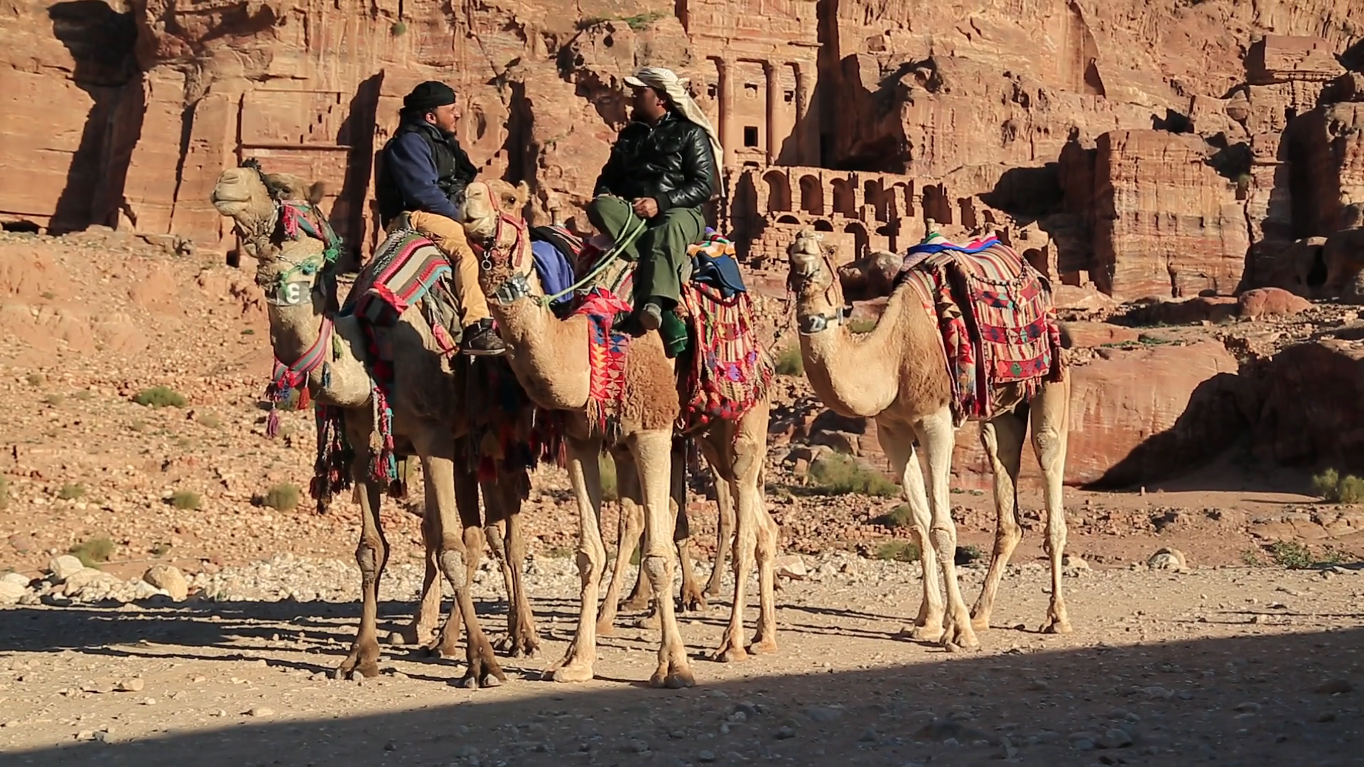 JORDAN, PETRA, DECEMBER 5, 2016: Jordanians on camels near Royal ...