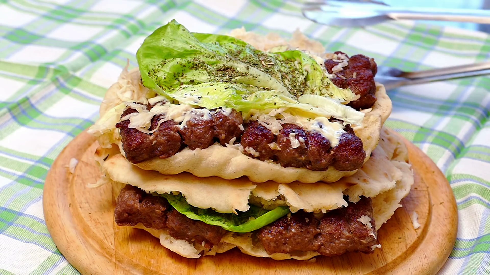 Juicy hamburger of pork and beef meat with mayonnaise and green ...