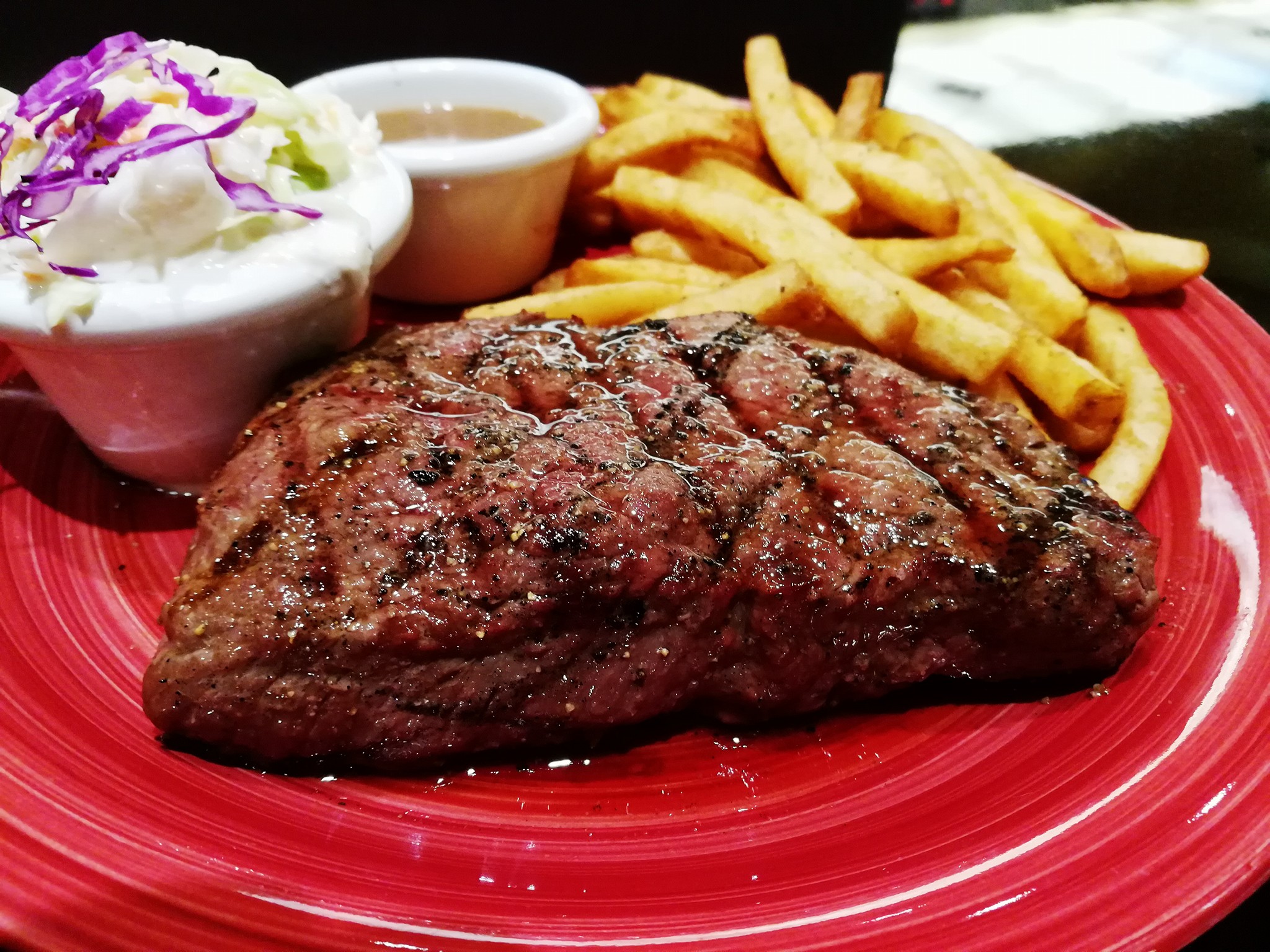 Incredibly juicy steak, medium cooked, with fries and salad, at Tony ...