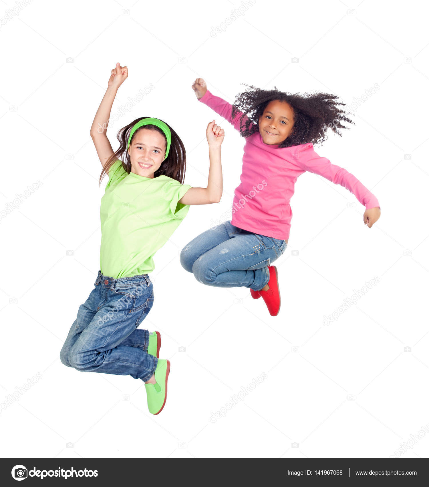 Two little girls jumping — Stock Photo © Gelpi #141967068
