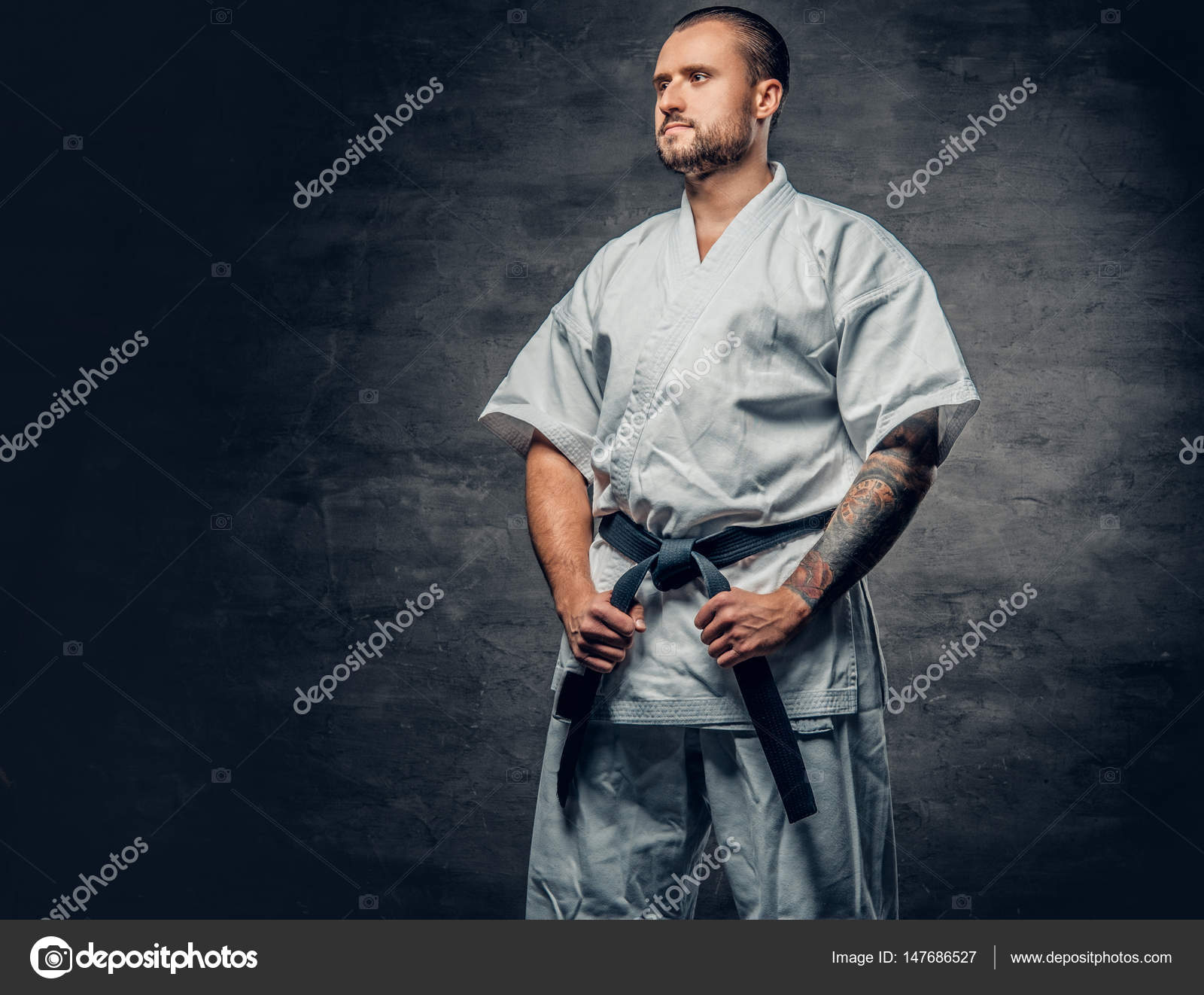 Karate fighter dressed in a white kimono — Stock Photo © fxquadro ...