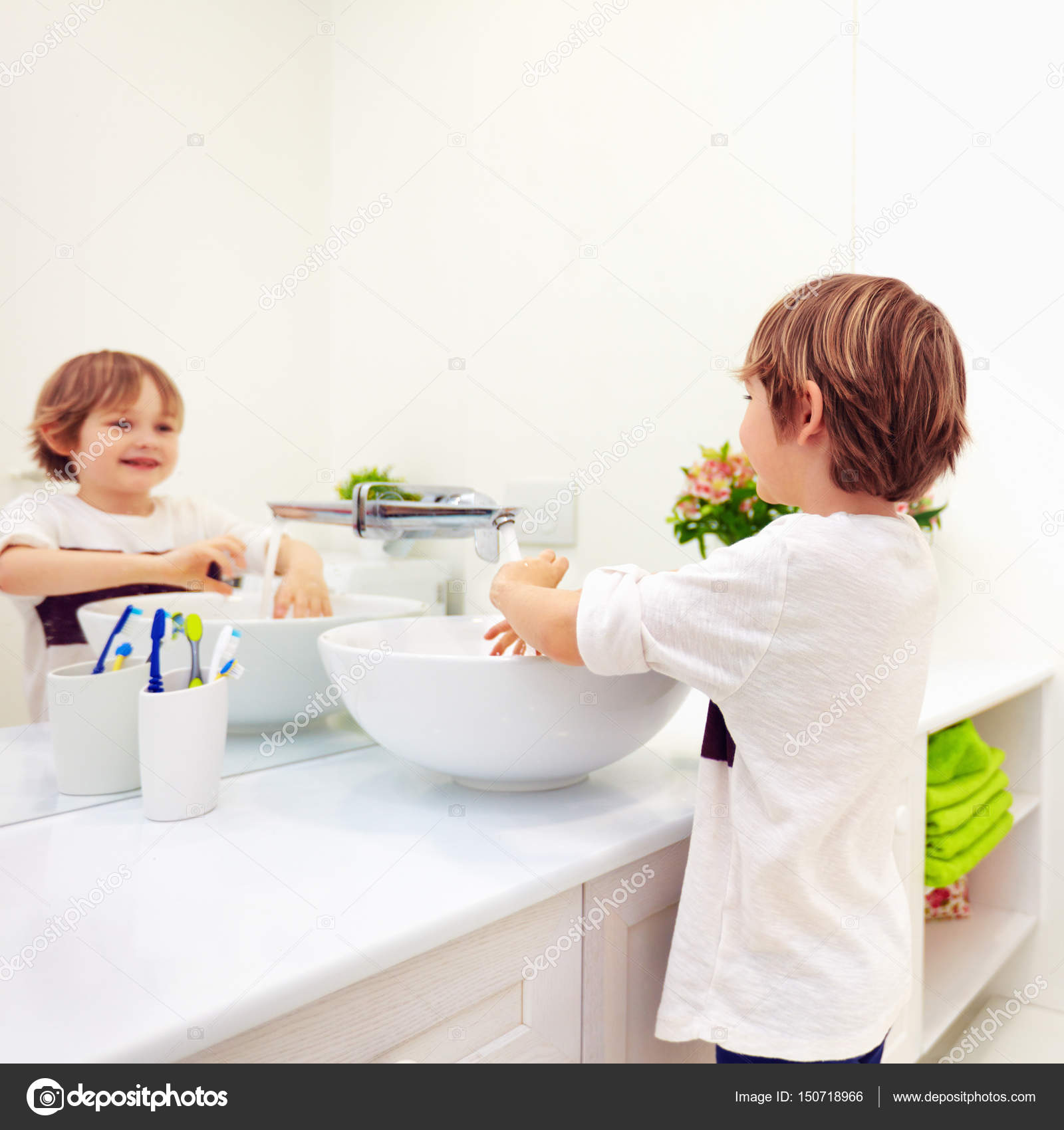 cute kid washing hand under tap water in bathroom — Stock Photo ...