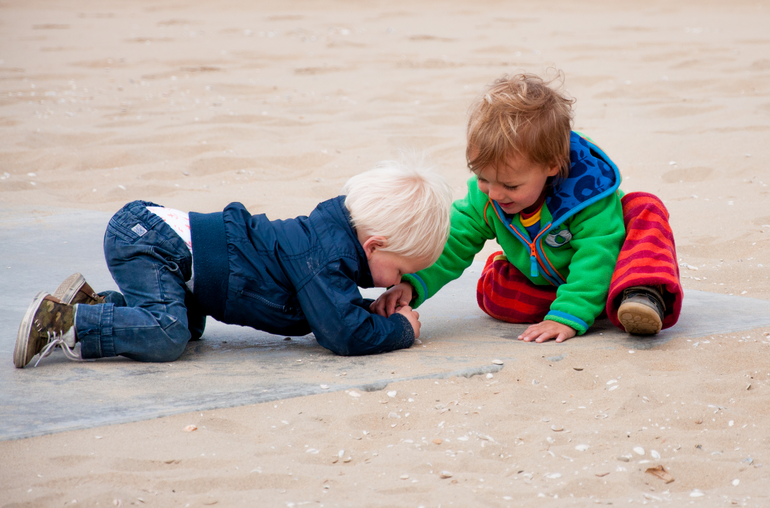 Kids playing on the beach photo