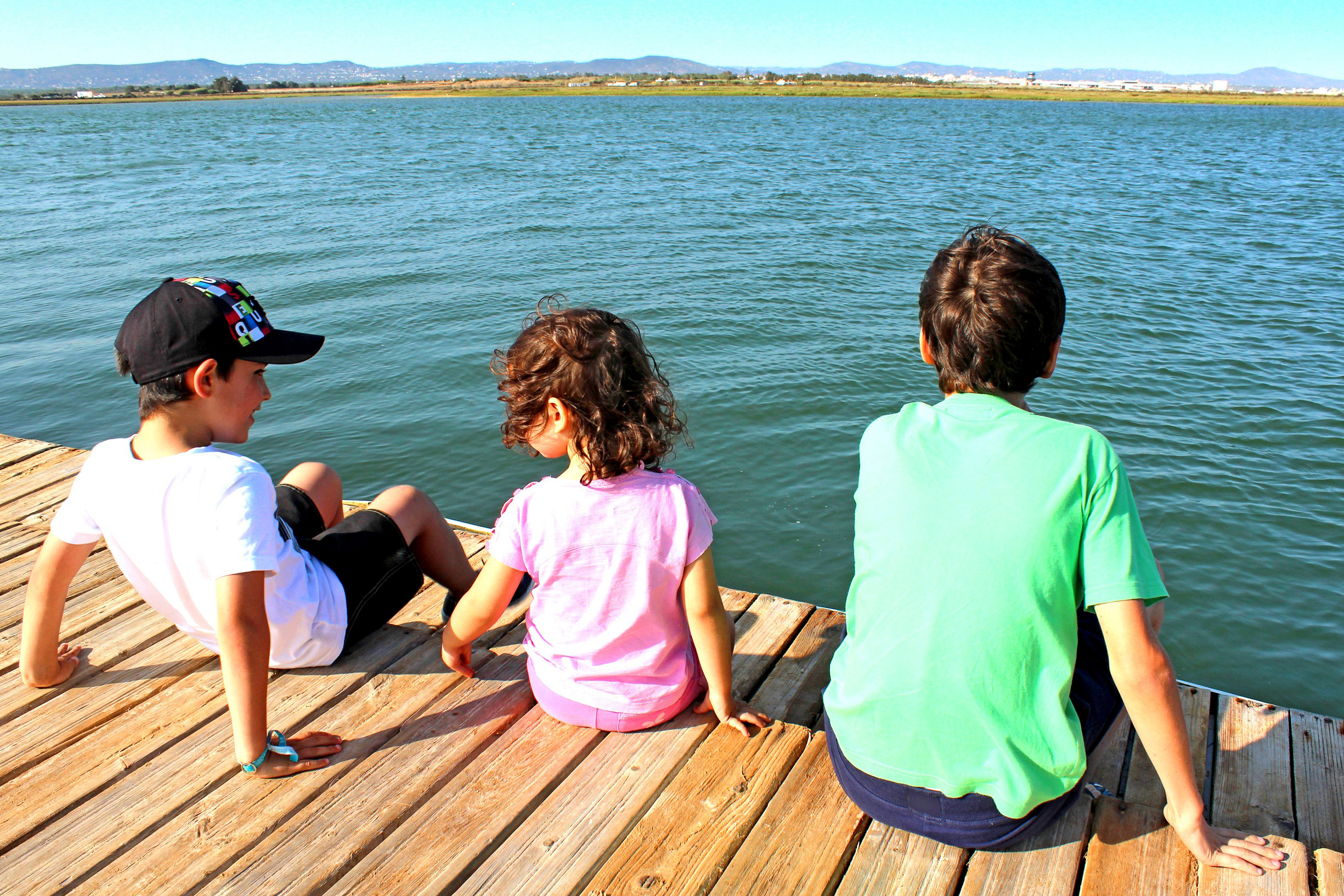 Kids socializing on the pier photo