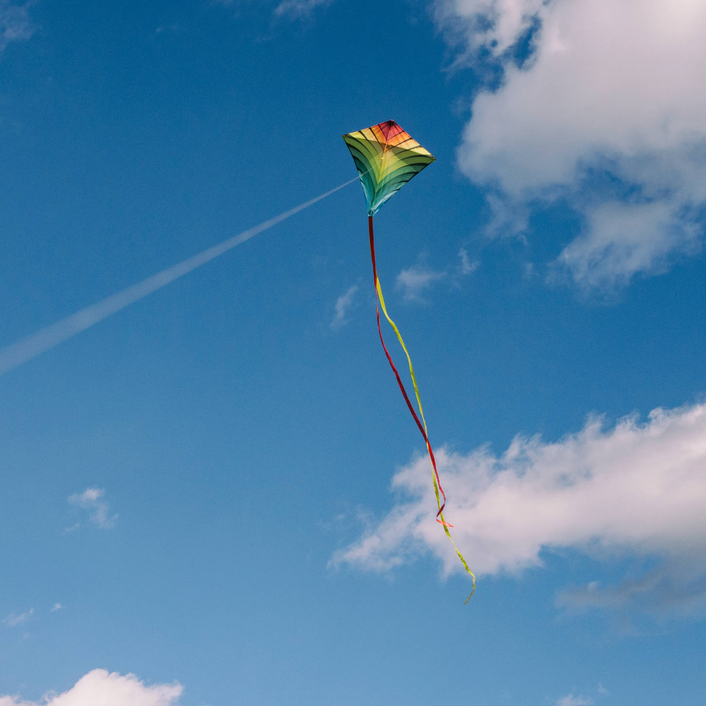 Kites Rise on the Wind: The Origin of Kites