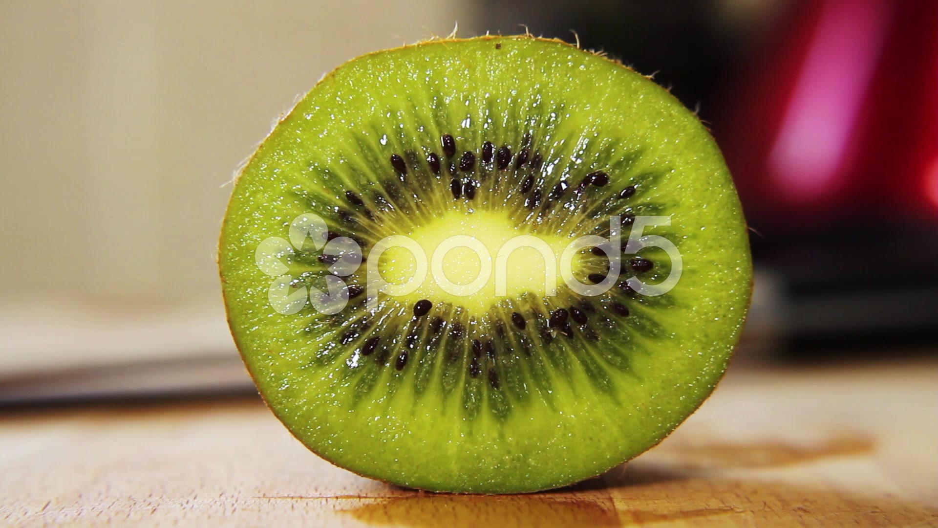 Food: Cutting Kiwi Fruit Close Up with Knife HD ~ Hi Res #49034436