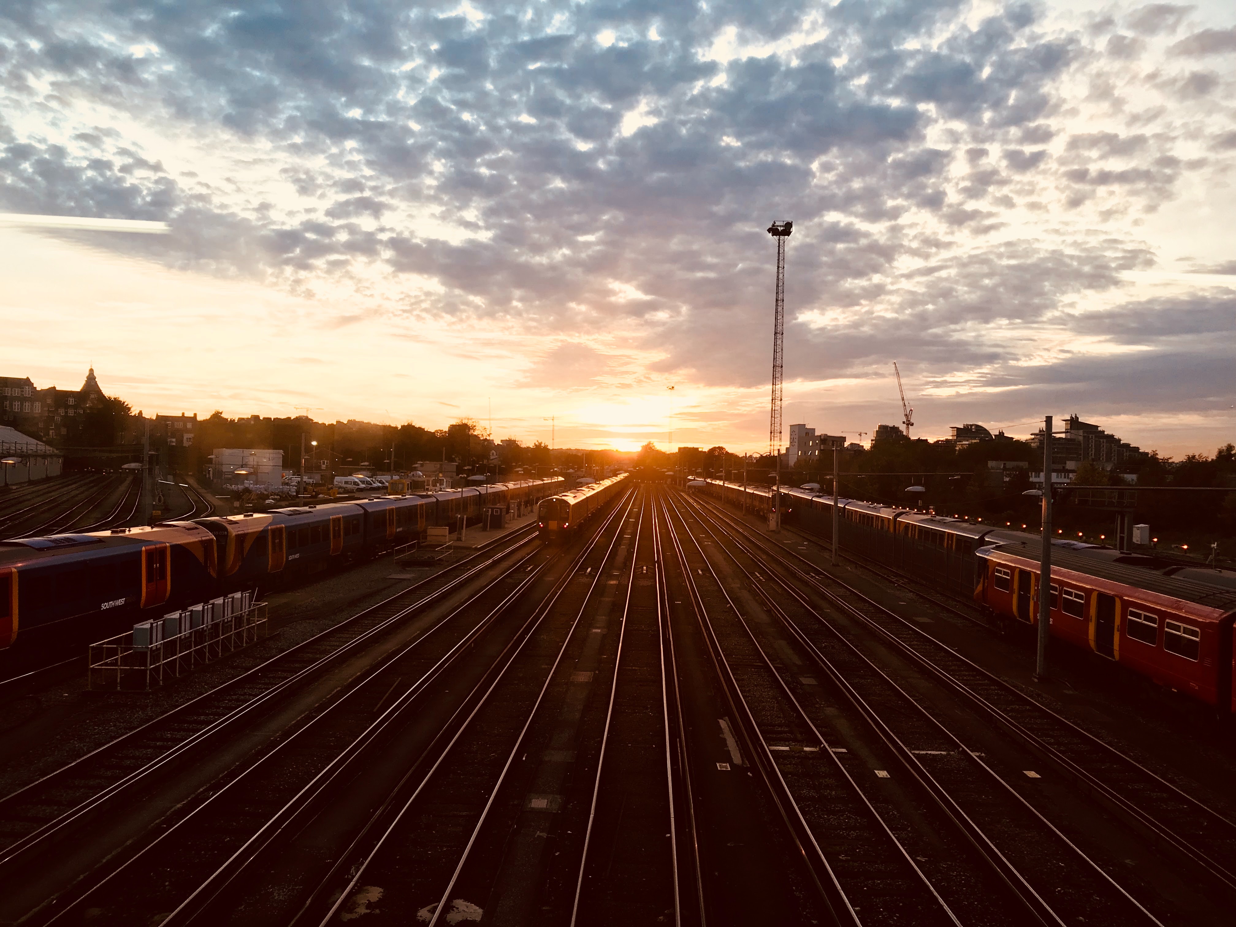 Landscape view of railway station during sunrise photo