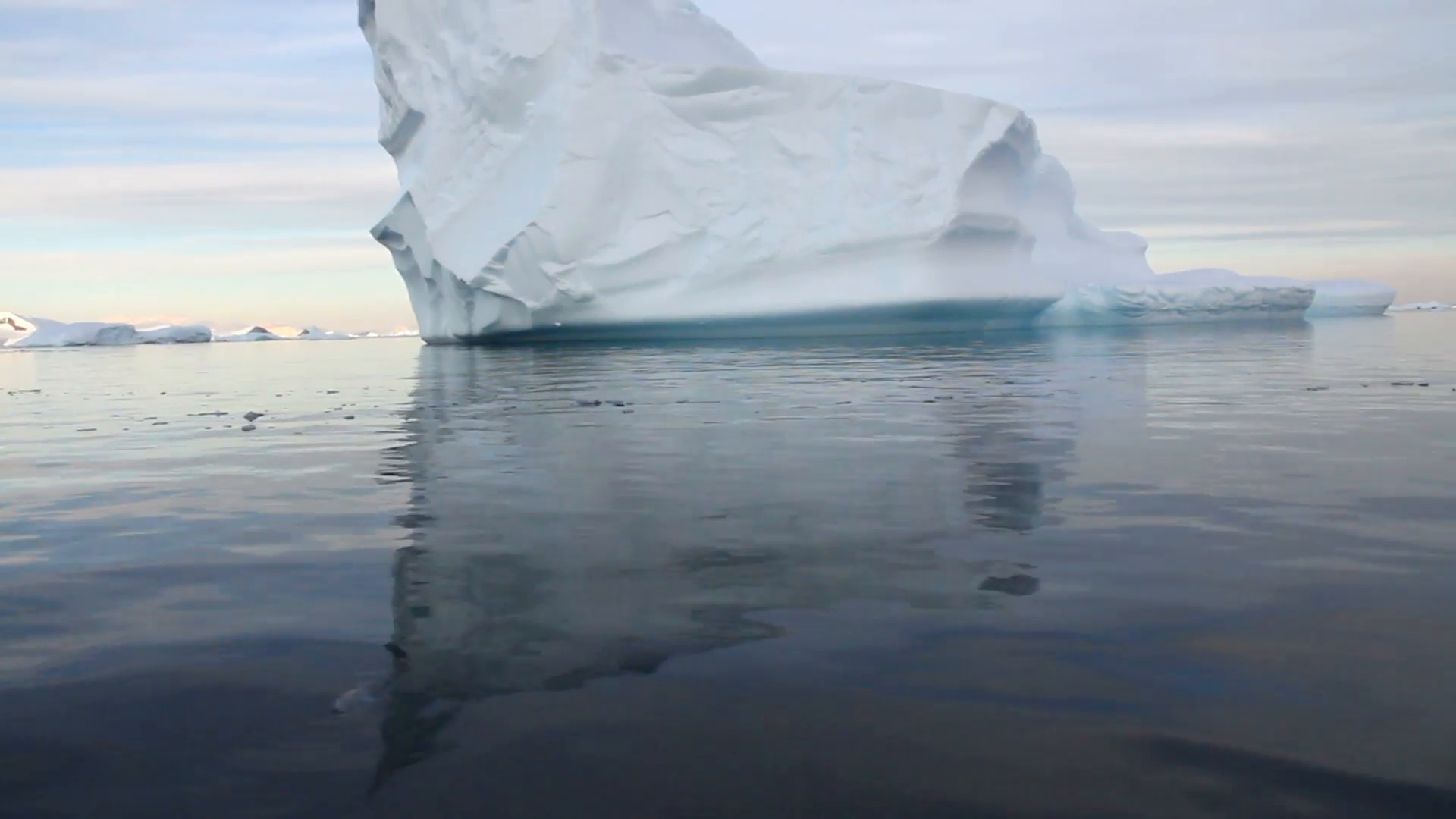 Large Iceberg Sailing near a Large Iceberg in Antarctica Stock Video ...