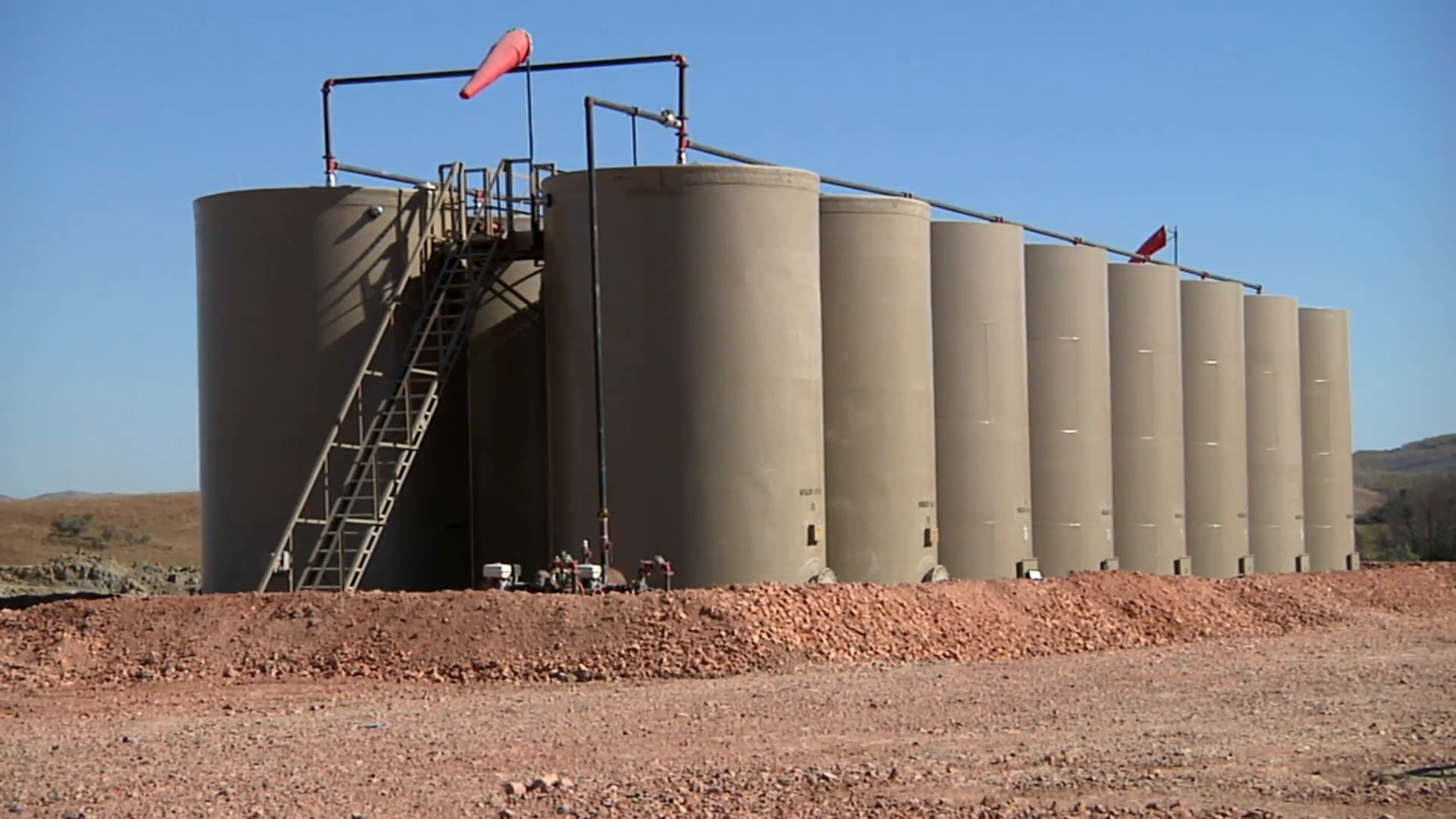 Oil Well Large Storage Tank Battery Stock Video Footage - Videoblocks