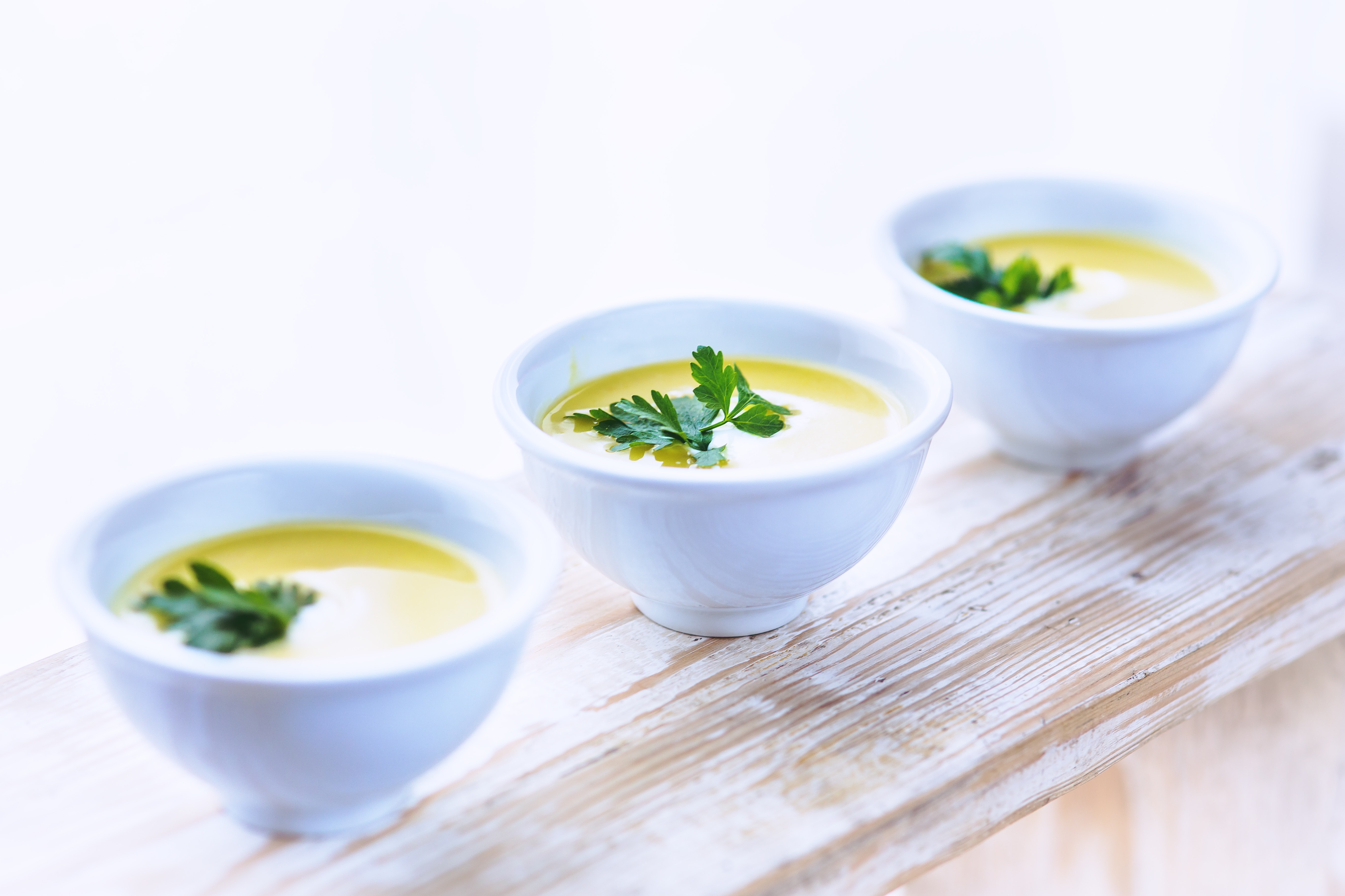 Leek and potato soup with parsley photo