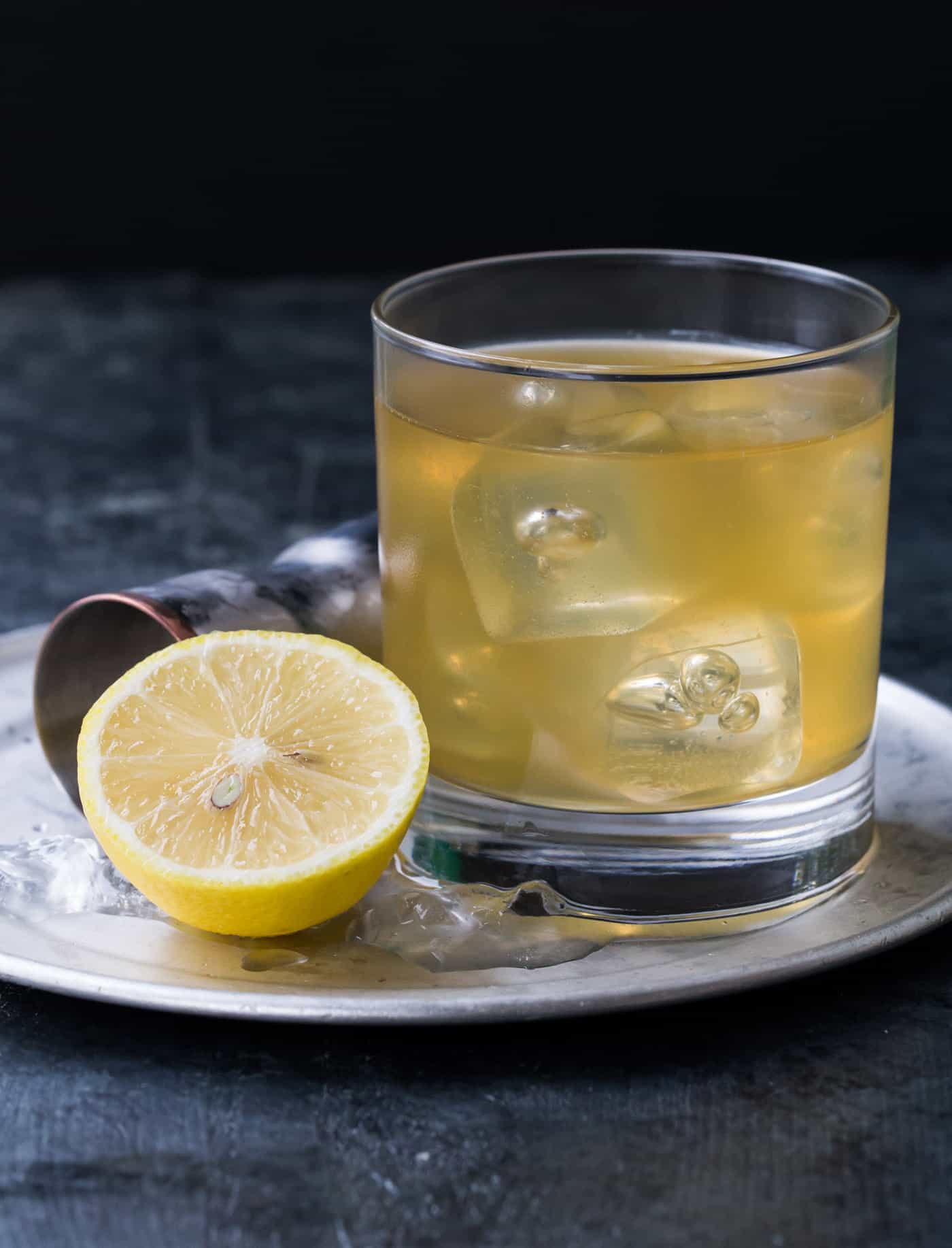 Gold Rush Cocktail - Garnish with Lemon