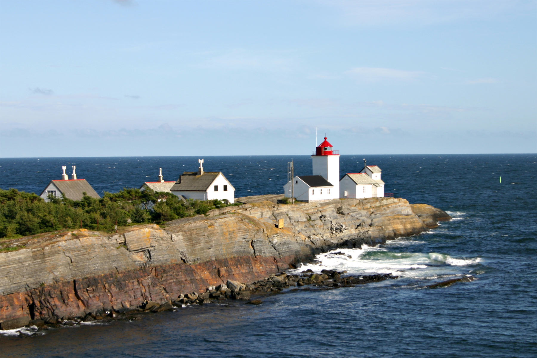 Lighthouse on cliffs photo