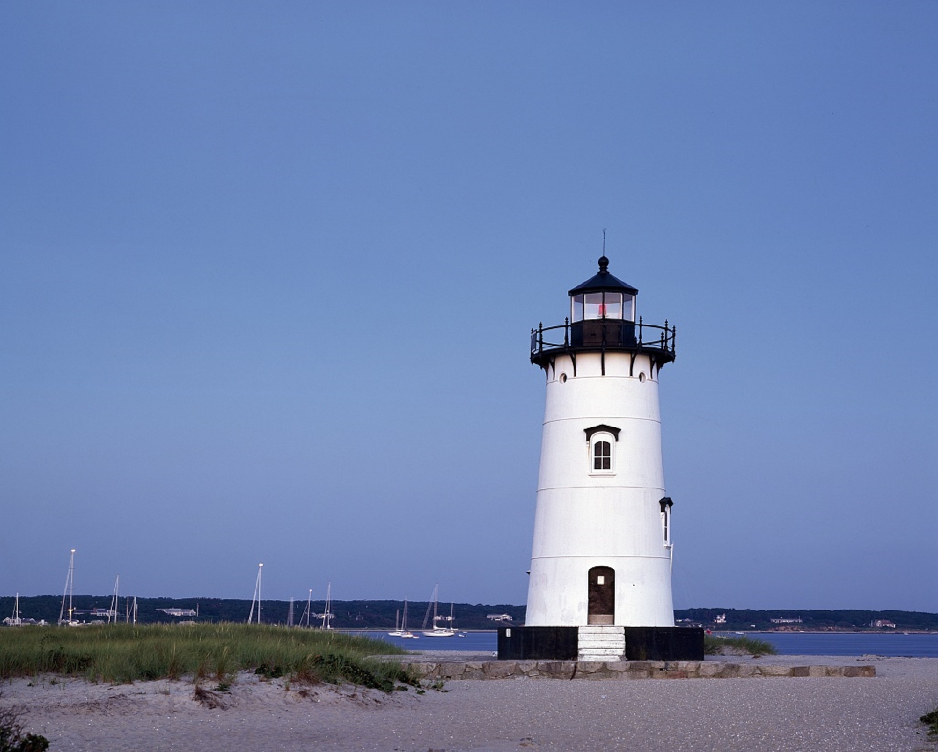 Lighthouse on the shore photo