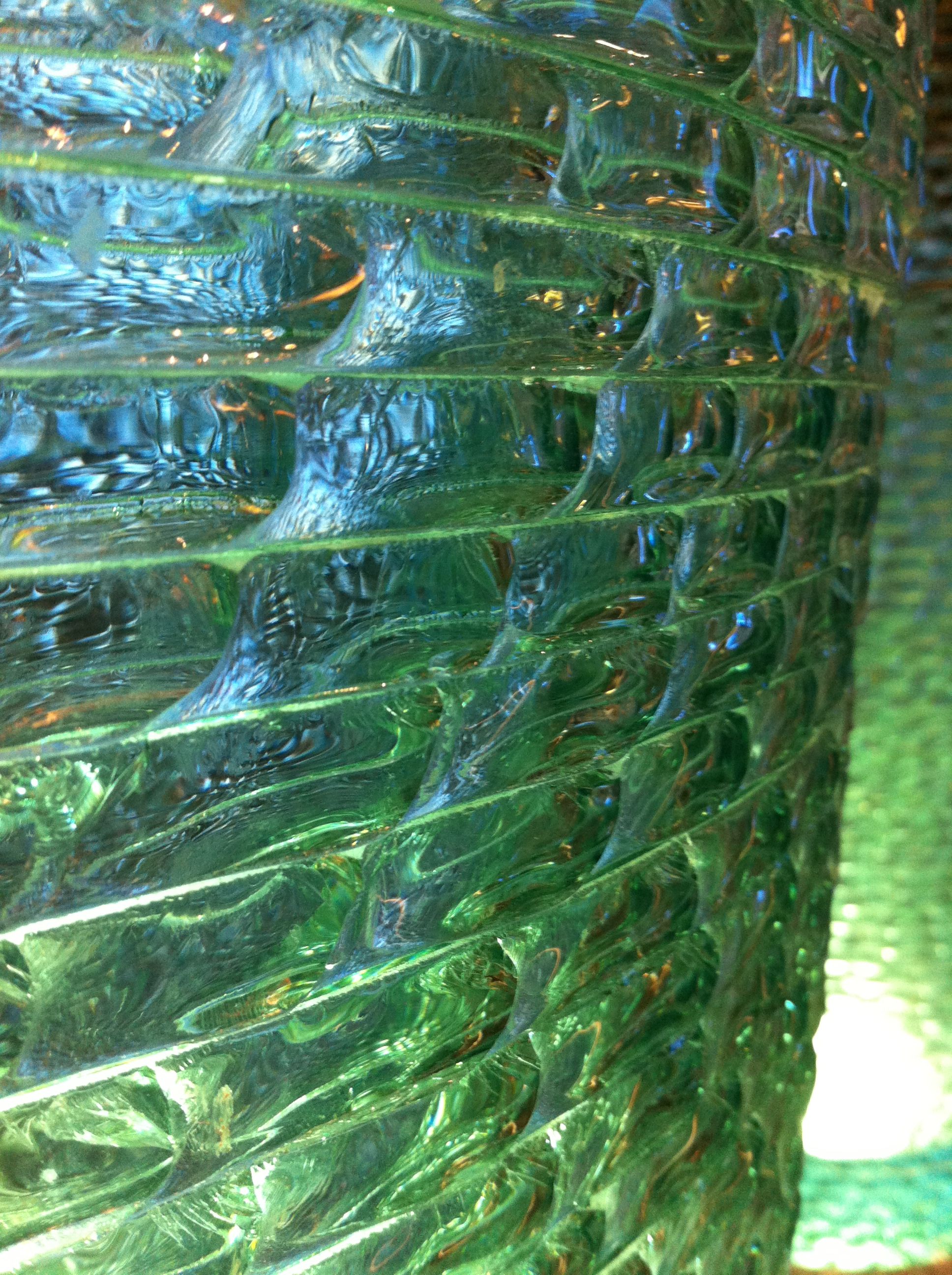 The light filtering through this #green #glass #planter makes it ...