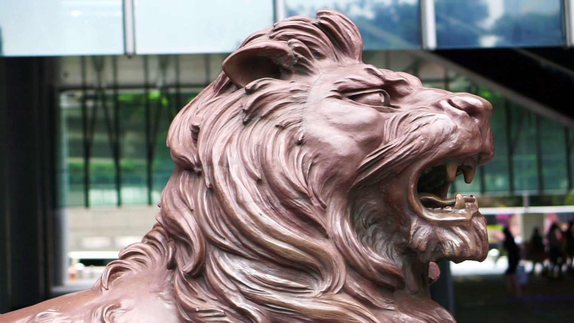 Editorial: Hong Kong - April 2016:Wet lion statue at the entrance of ...