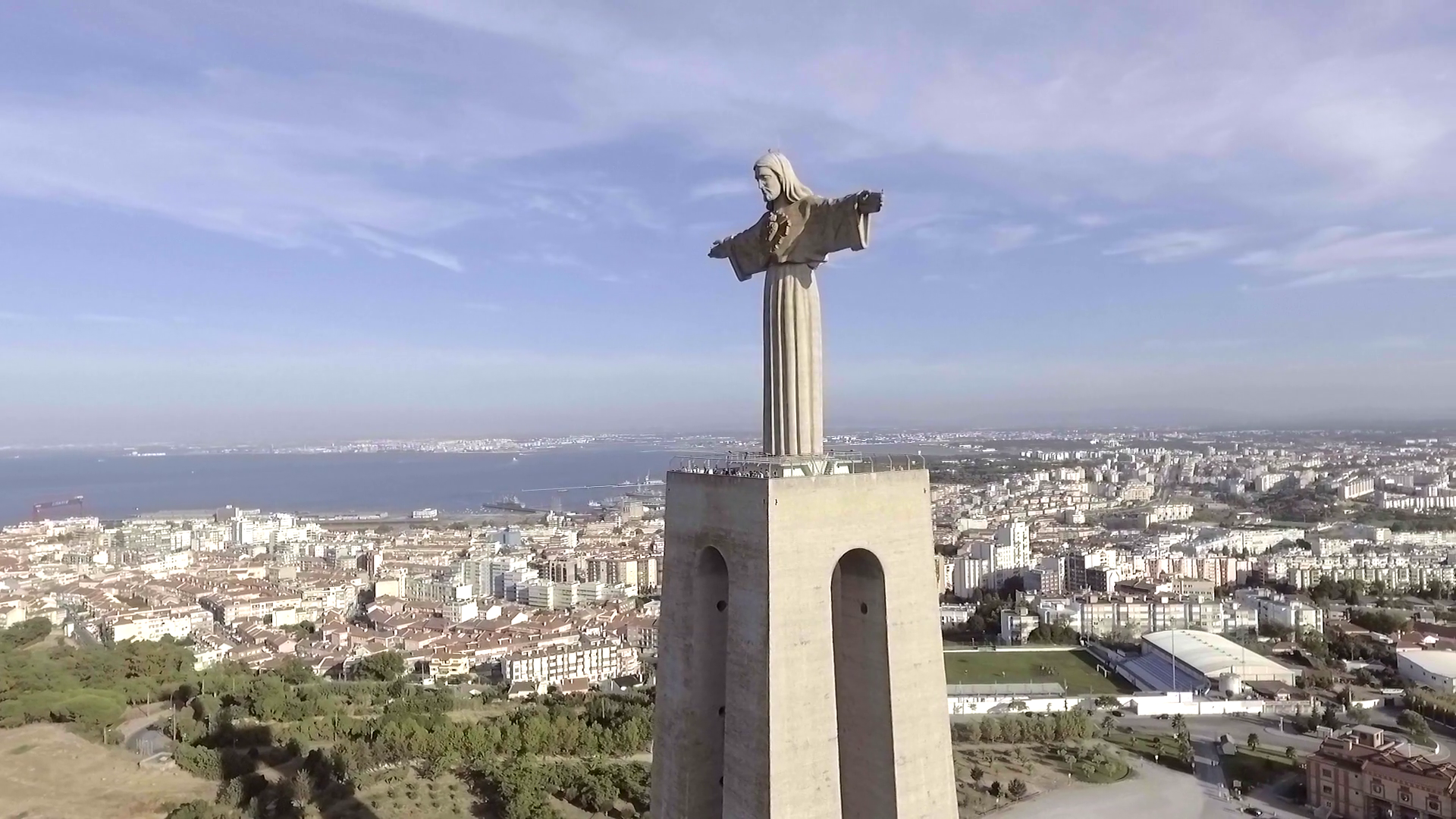 Christ the King statue in lisbon, portugal, aerial shot Stock Video ...