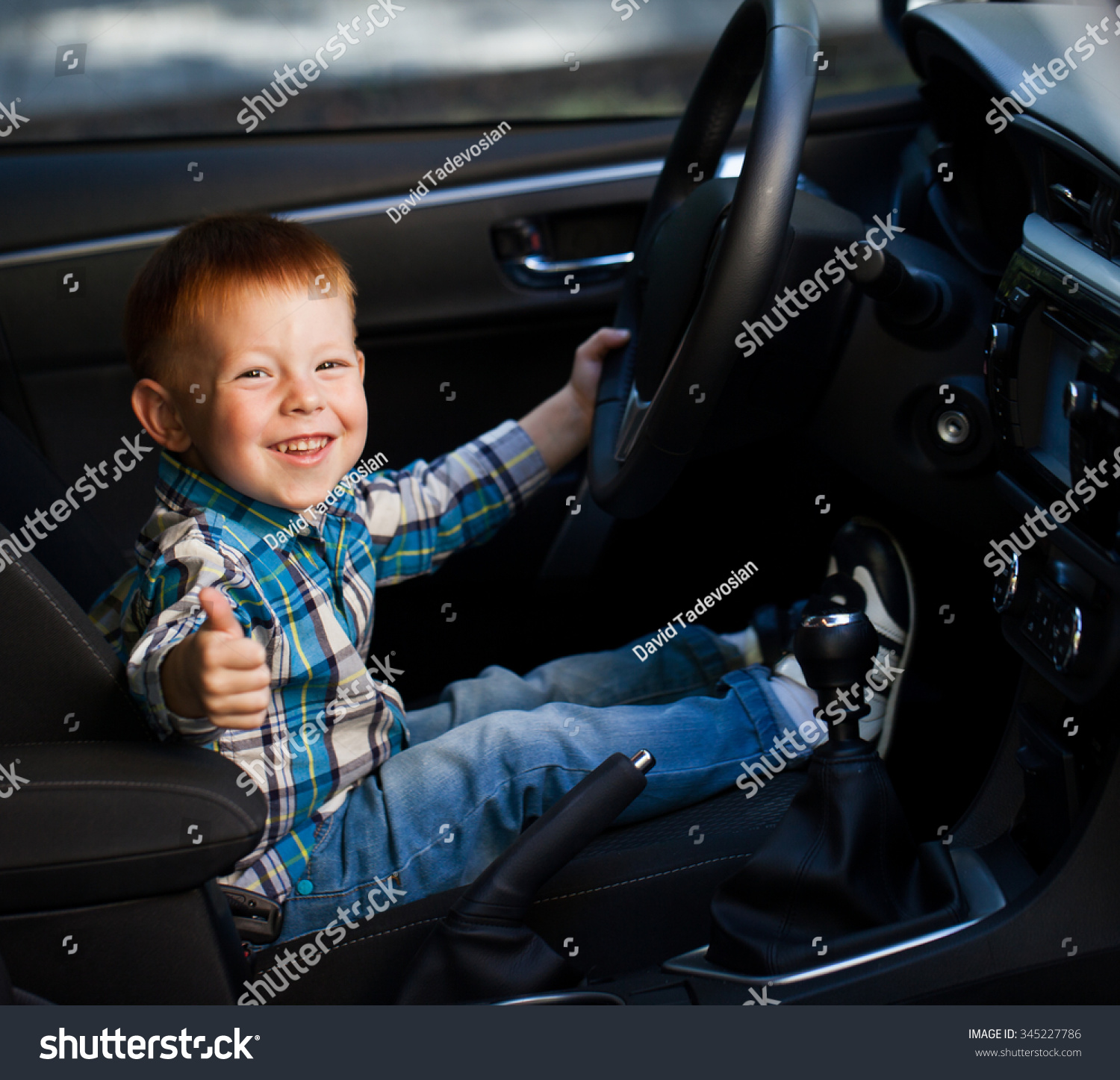 Cute Little Boy Driving Fathers Car Stock Photo (Royalty Free ...
