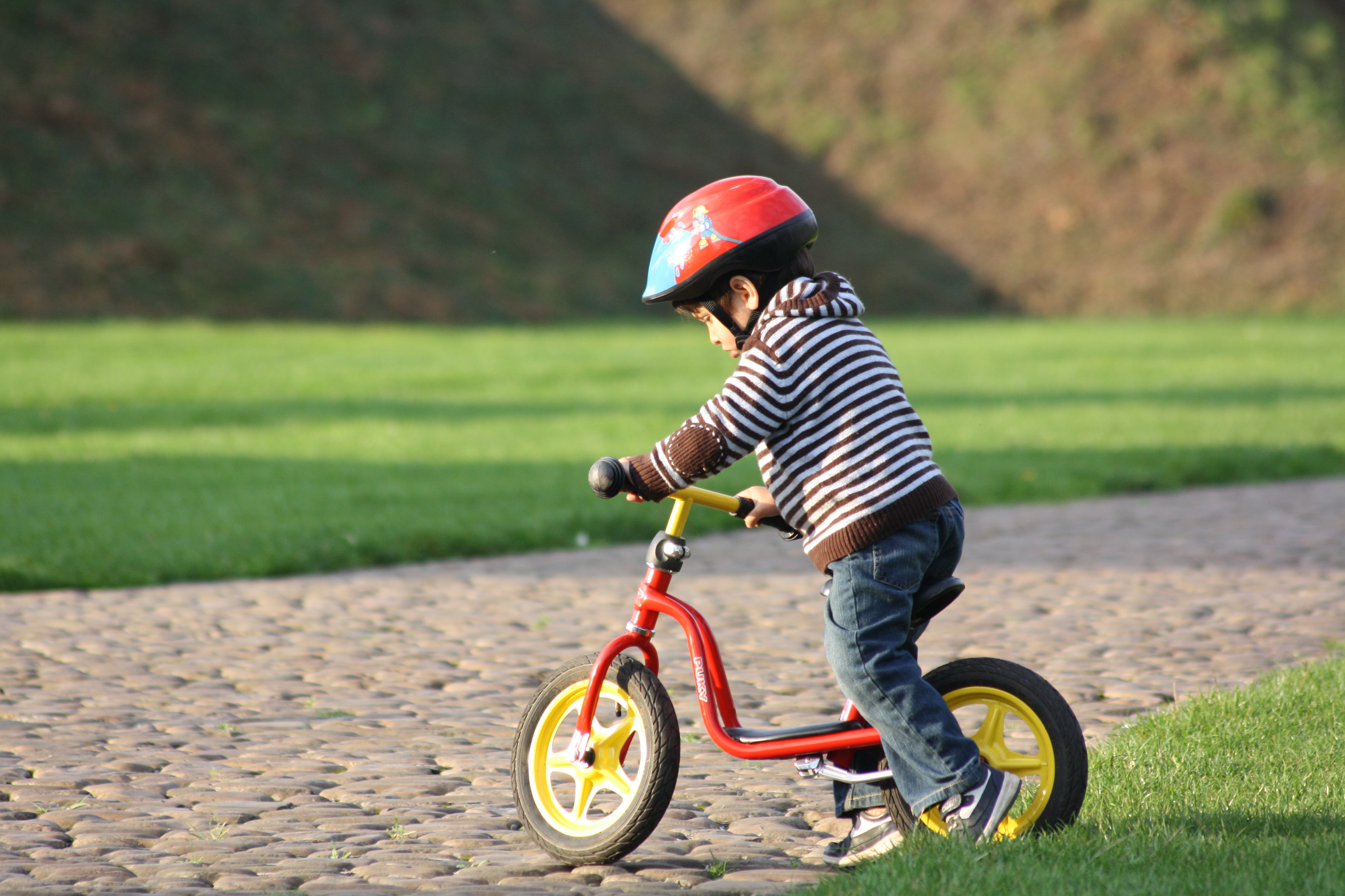 Little boy on bike photo