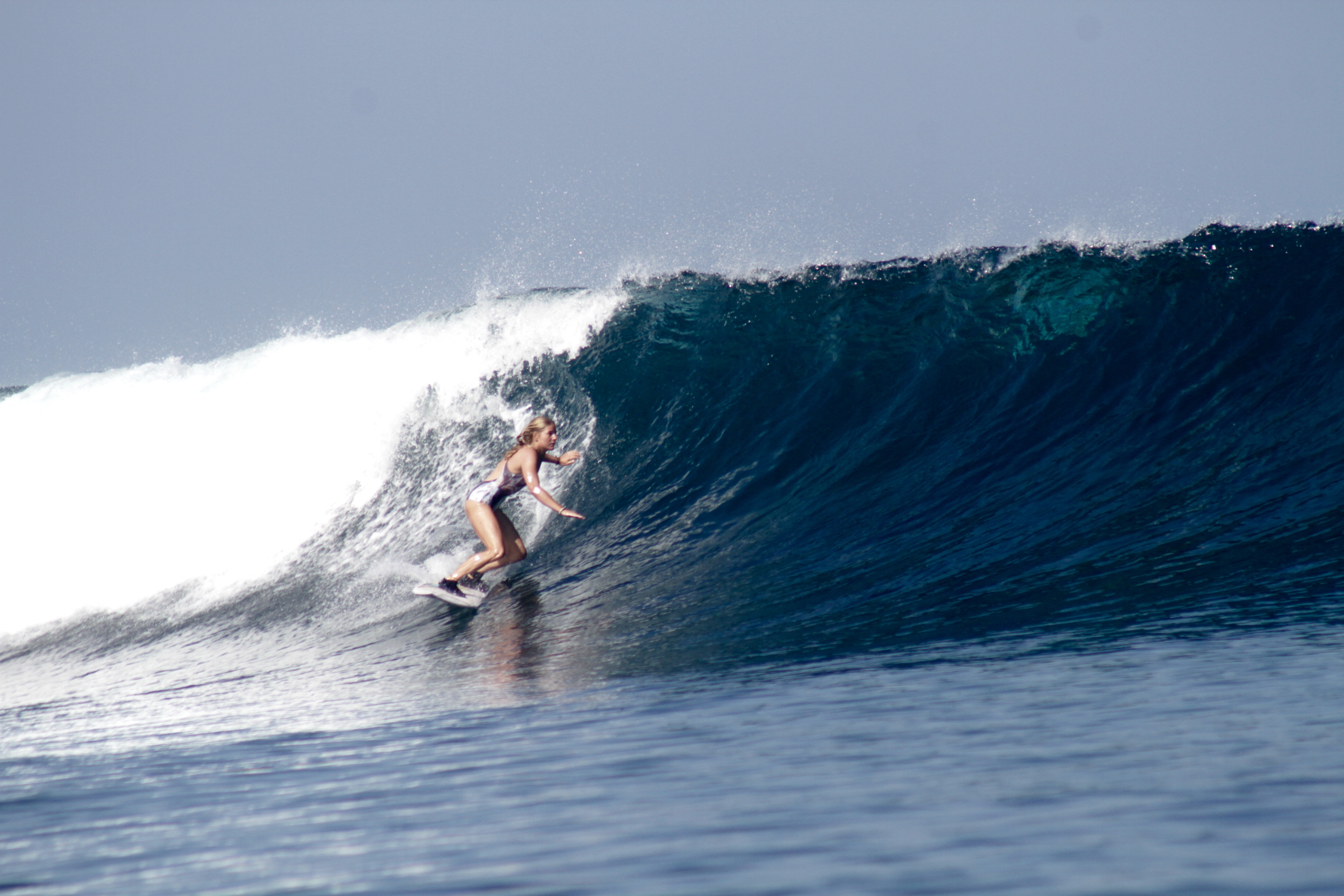 Surfing at Kuta Beach, Bali - SurfGirl Magazine