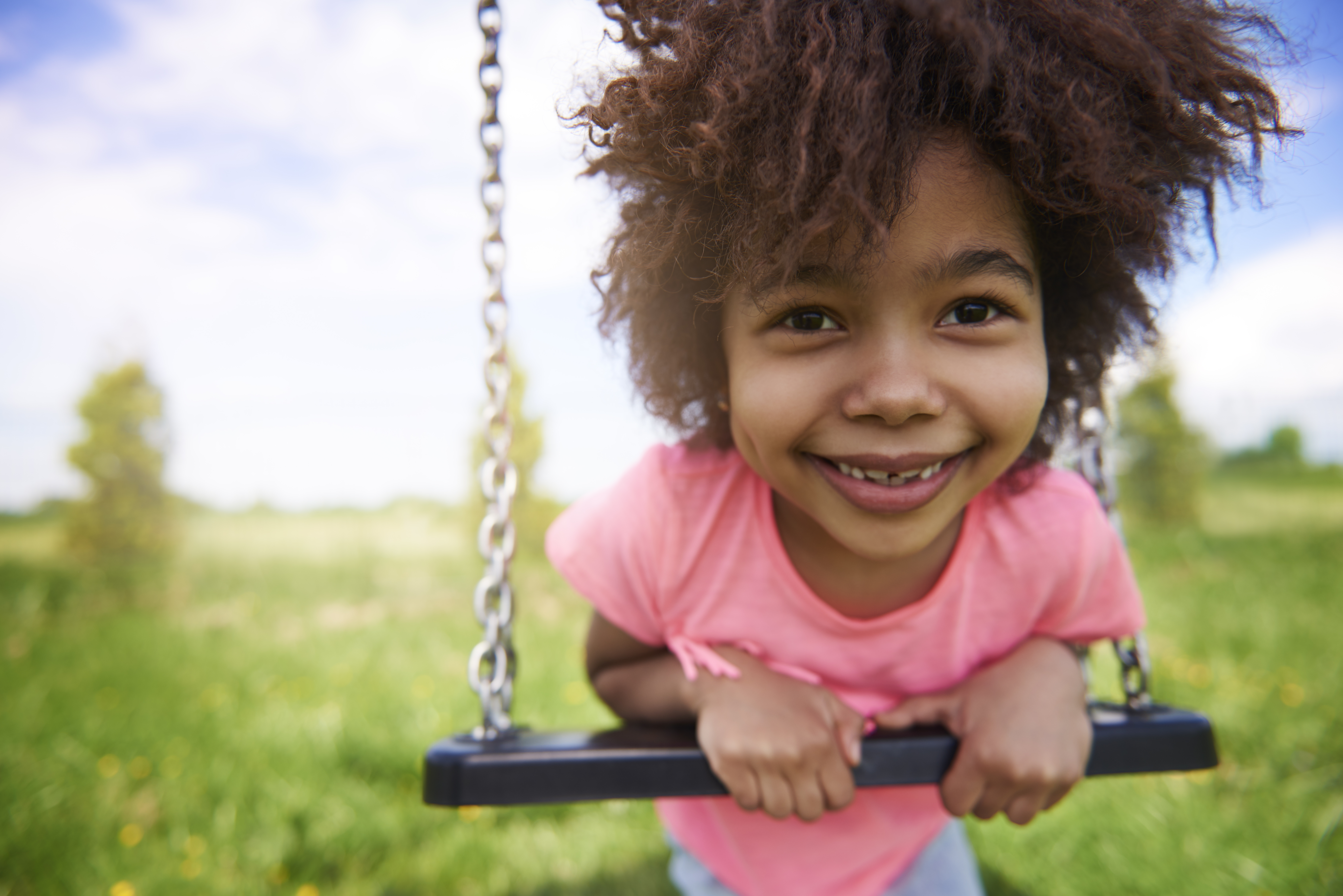 Little girl on the playground - Public Health Department
