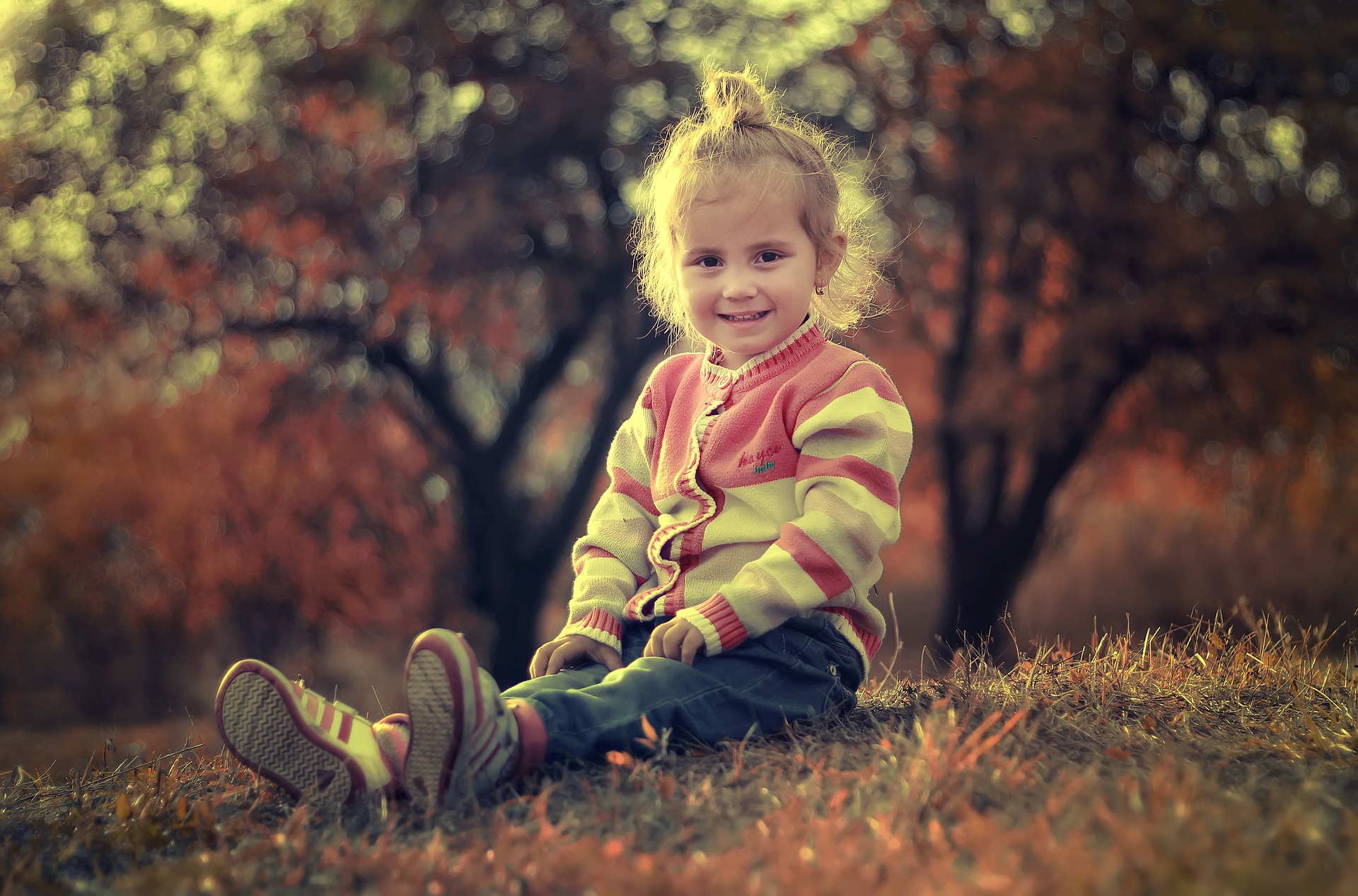 Little girl in the park photo