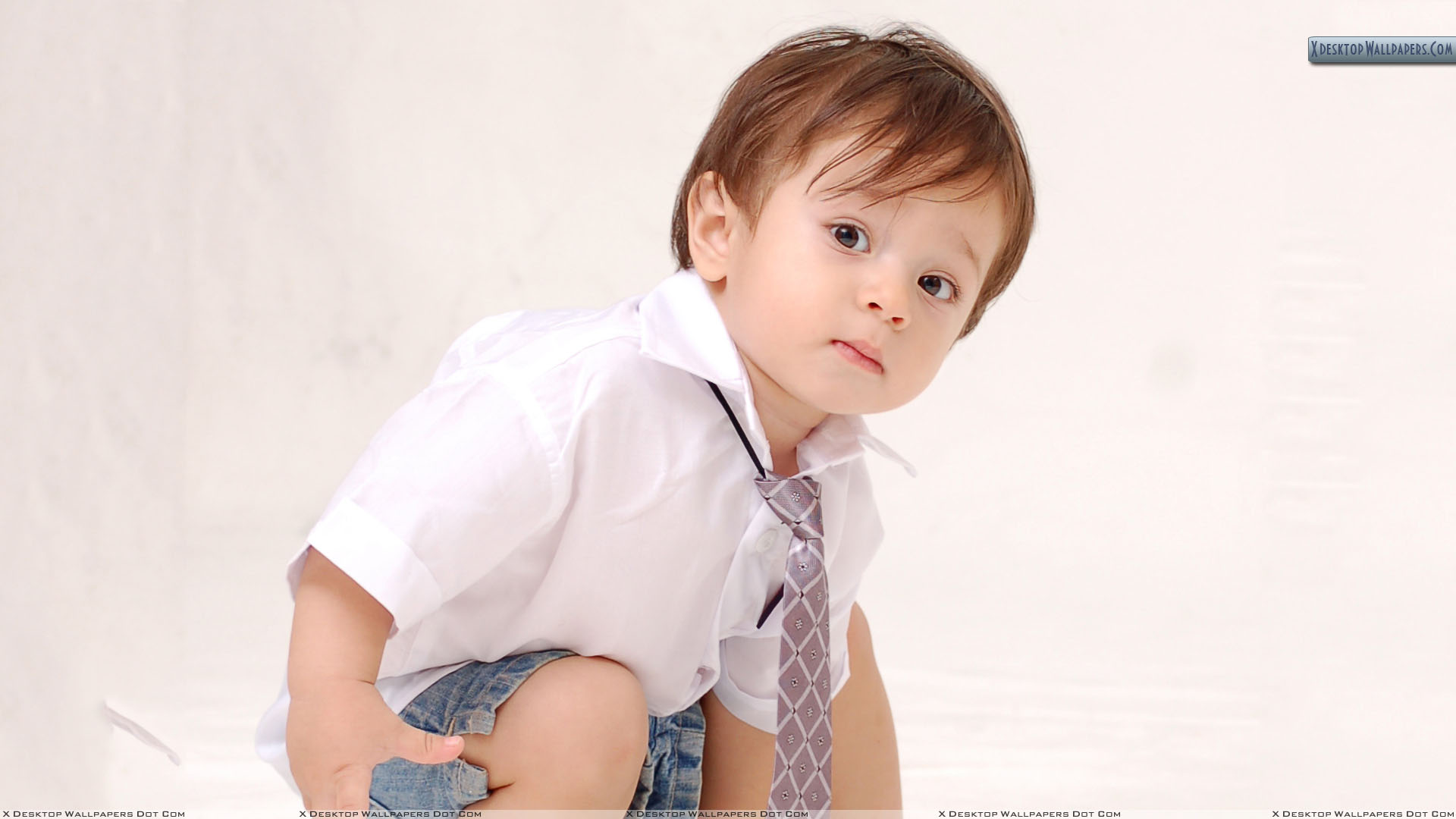 Little Kid Sitting In School Dress Wallpaper