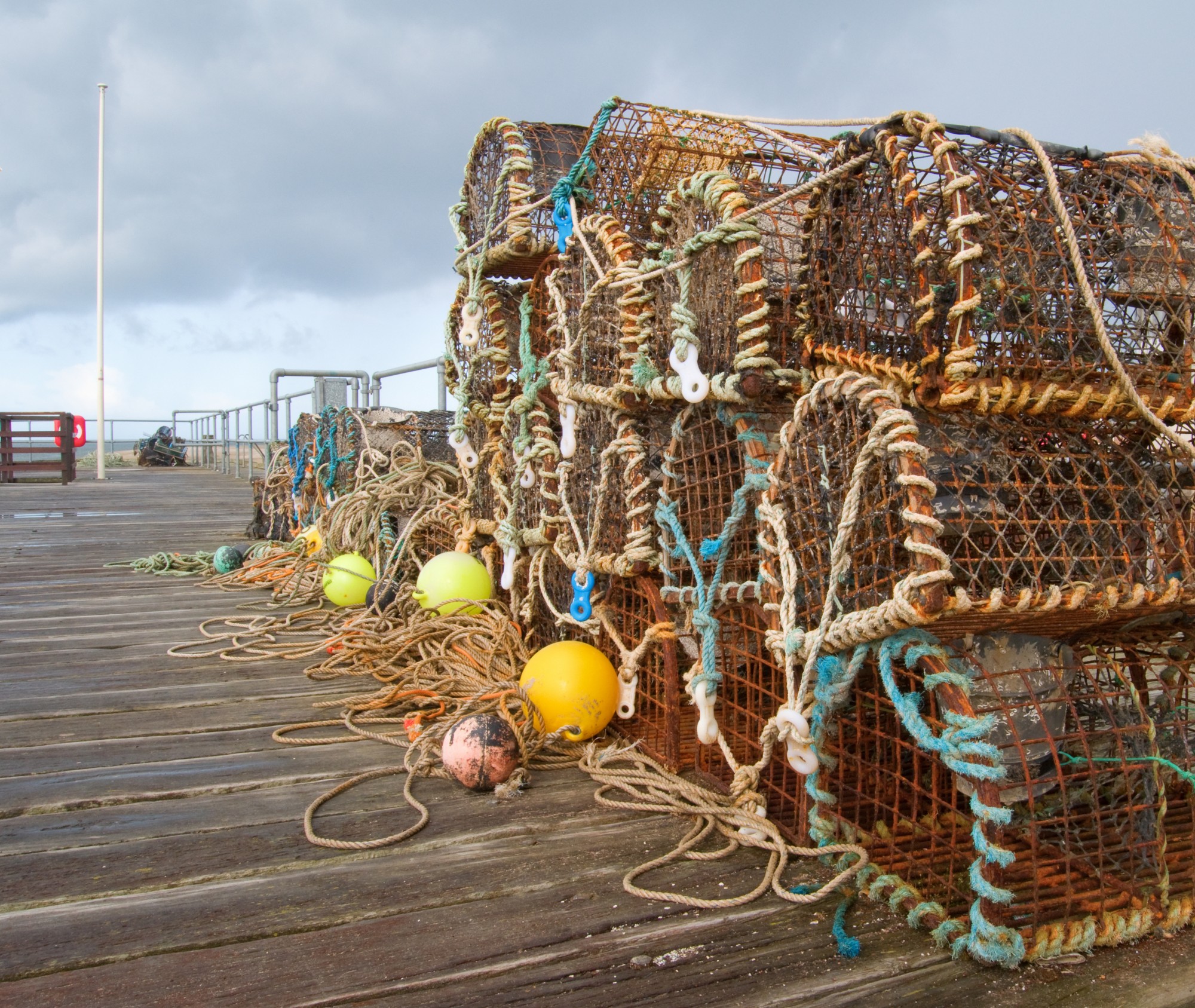 Lobster pots of the Aberdovey pier – Aberdovey Seafront Accommodation