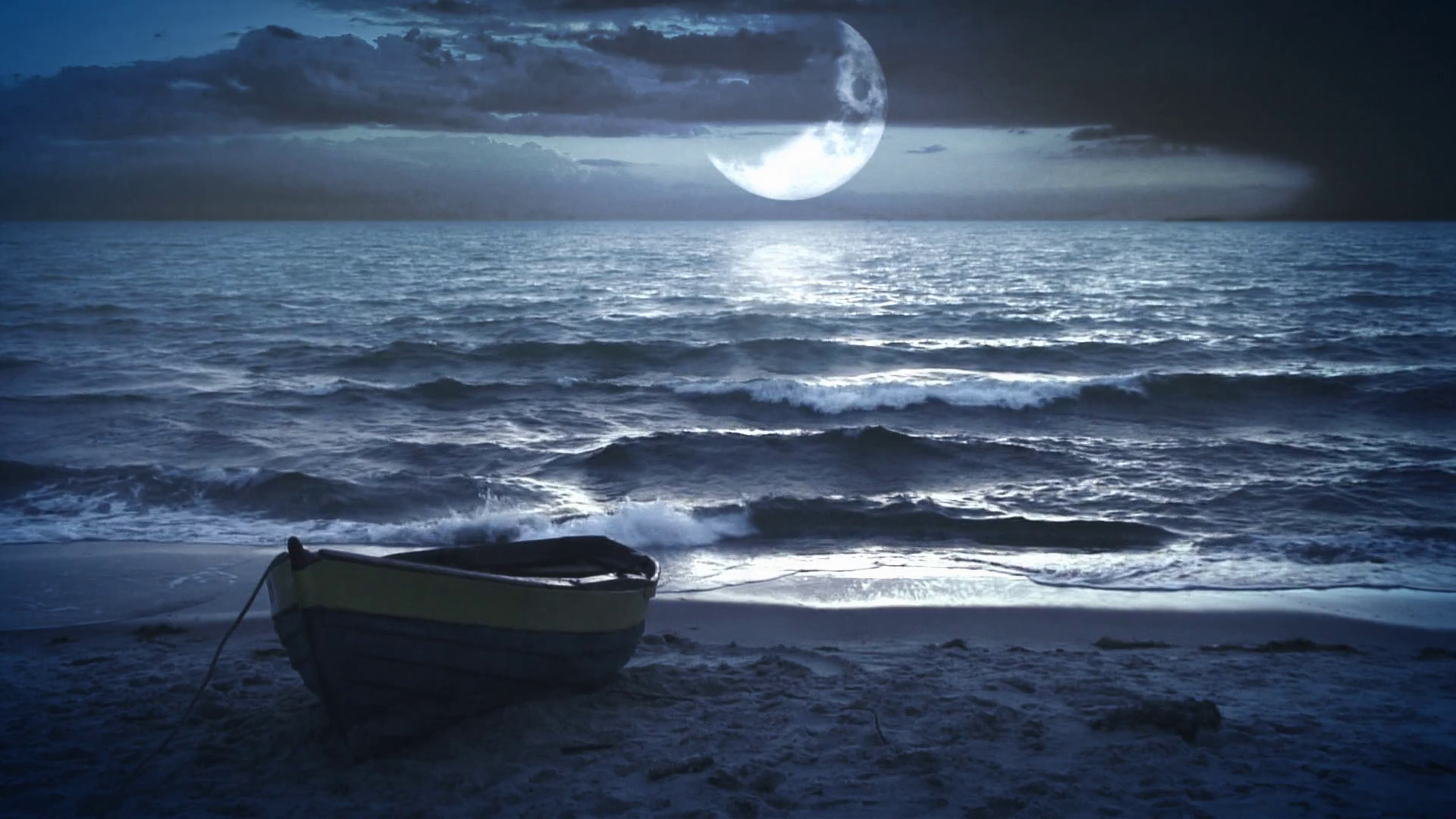 Lonely boat at night with a beautiful big waxing moon above the sea ...