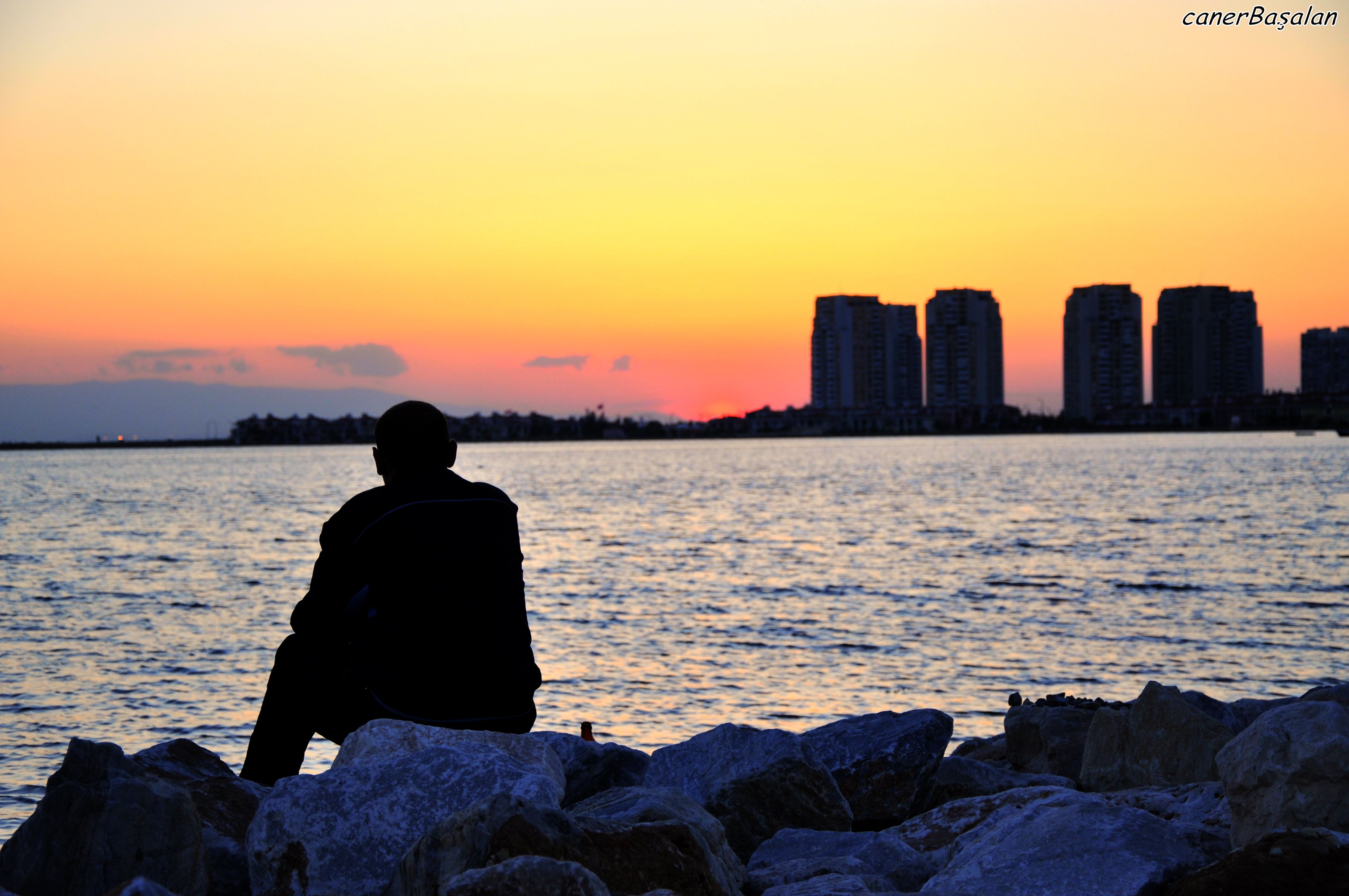 a lonely guy watching sundown by svennG on DeviantArt