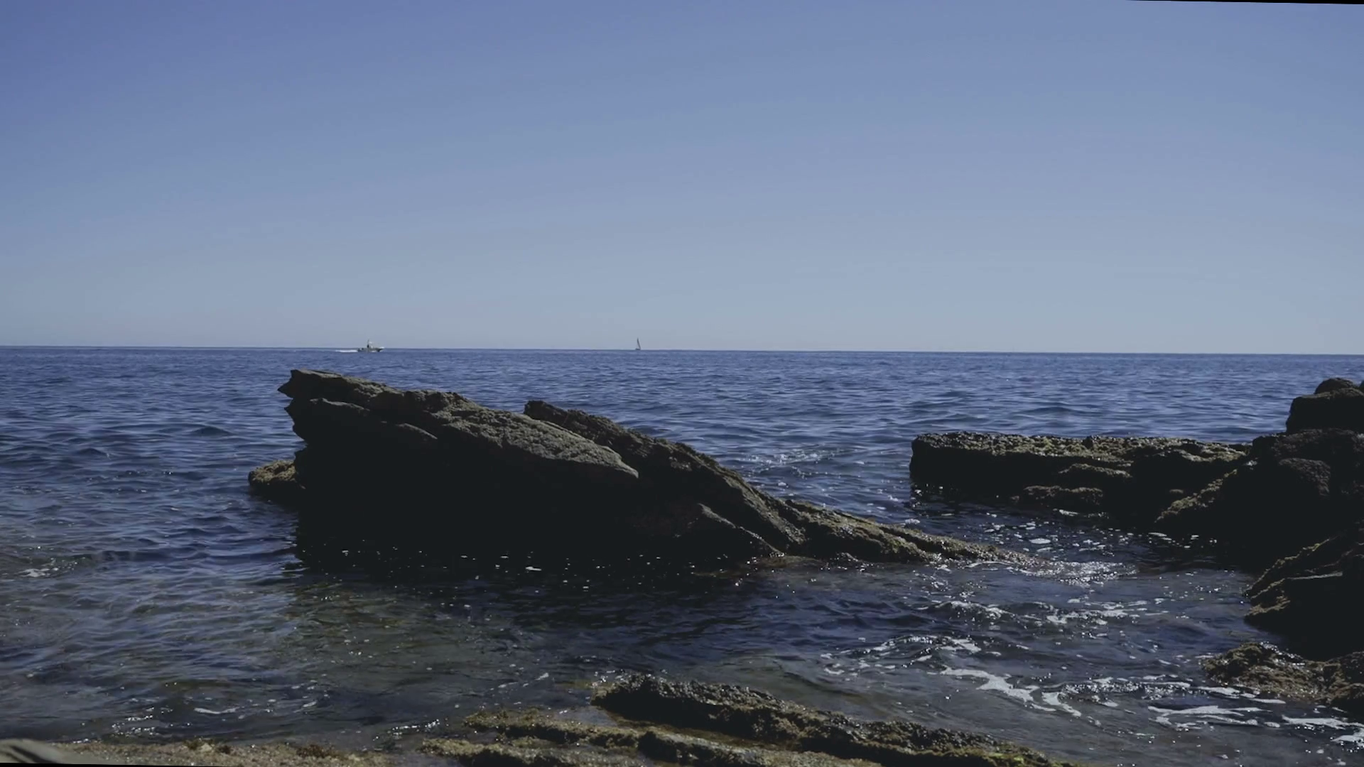 Lonely Rock immerged into the Sea Stock Video Footage - Videoblocks
