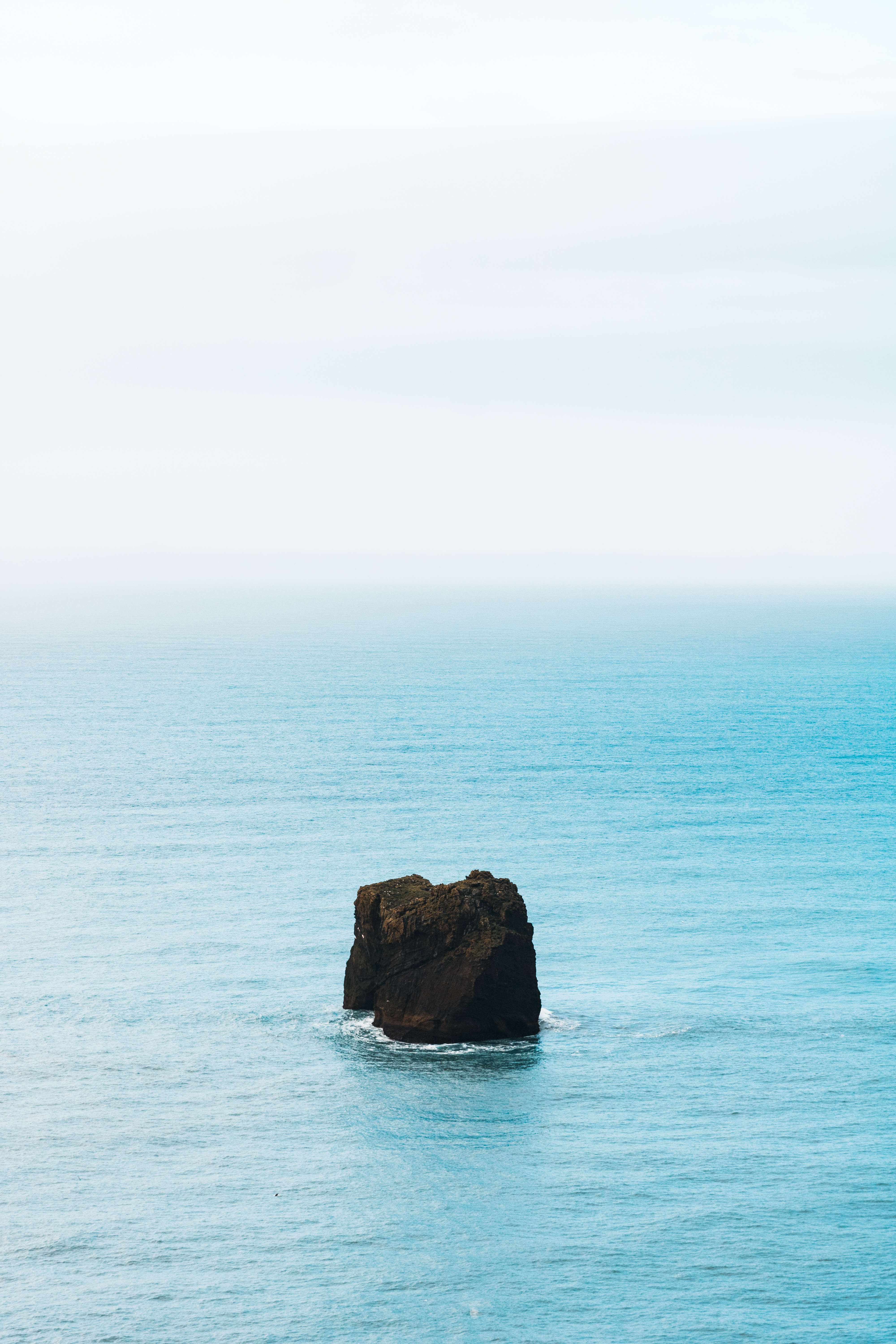 Free Photo of Lonely Rock in the Ocean