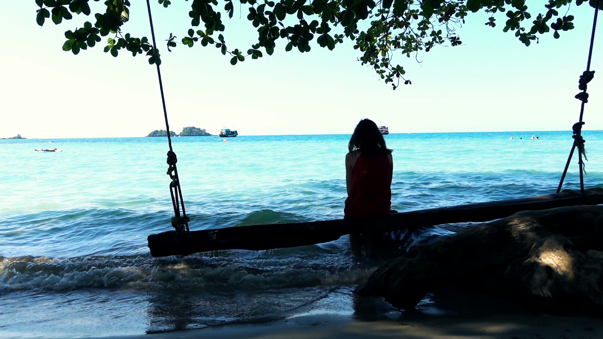 Young lonely woman sitting on beach swing Stock Video Footage ...