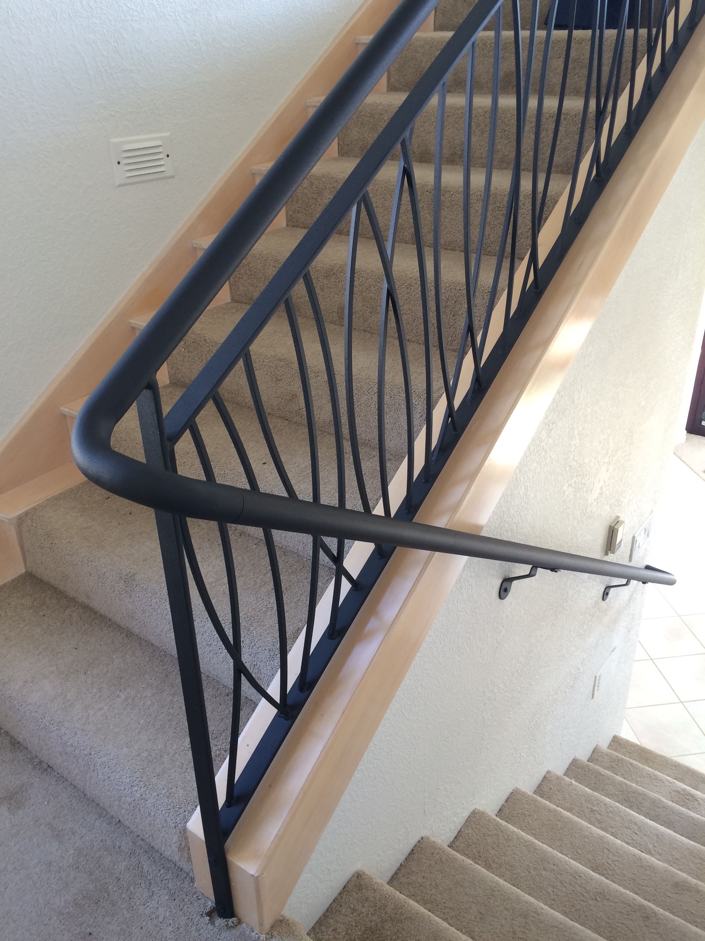 Custom residential wall mount stair rail system with 