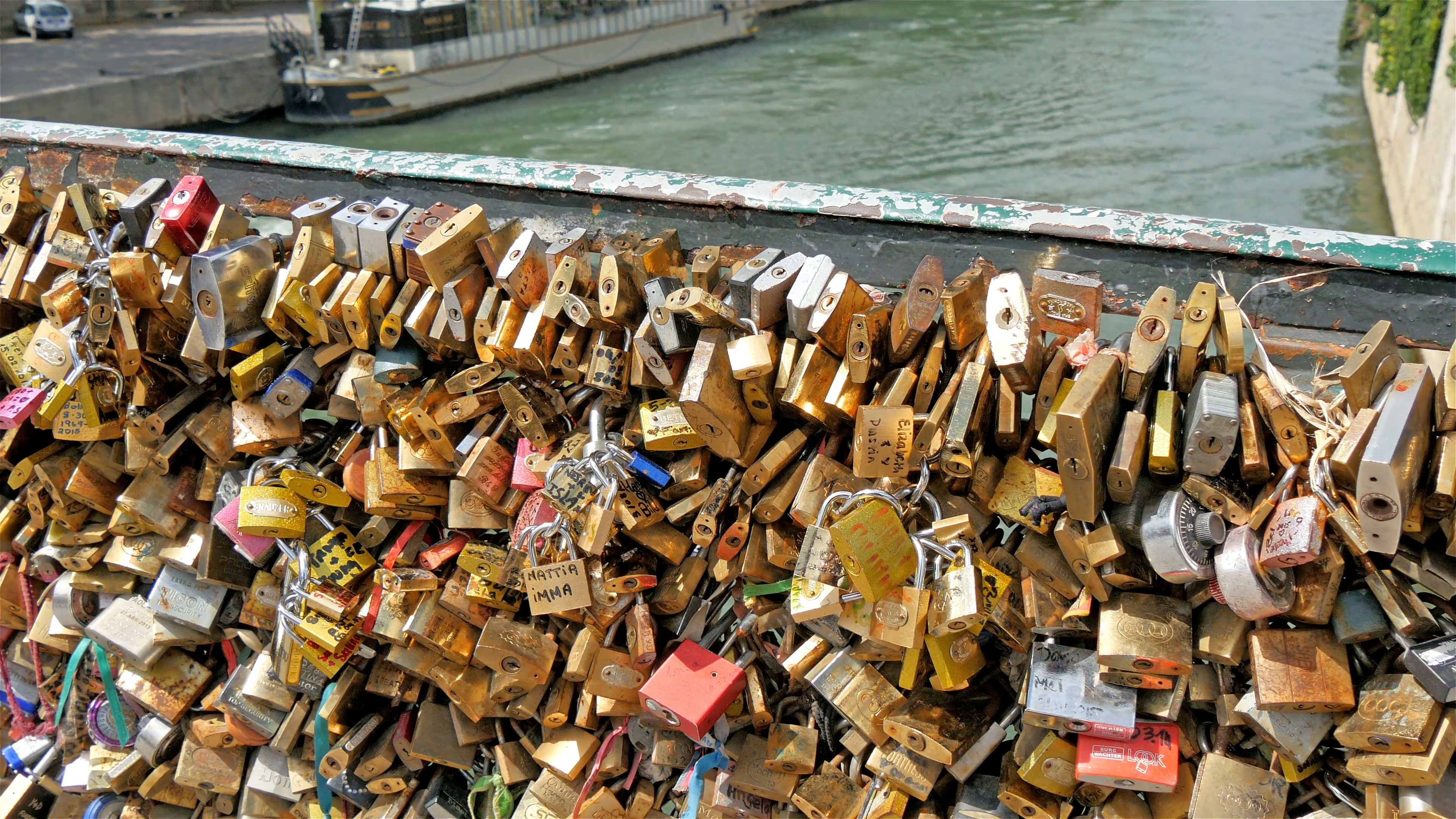 The famous tourists attraction of Paris love locks bridge Stock ...