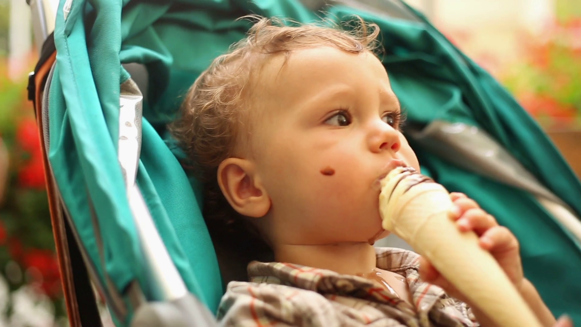 Lovely kid is eating a ice cream in the stroller Stock Video Footage ...