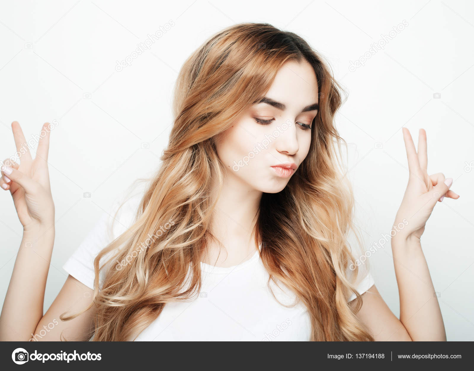 lovely woman showing victory or peace sign — Stock Photo © kanareva ...