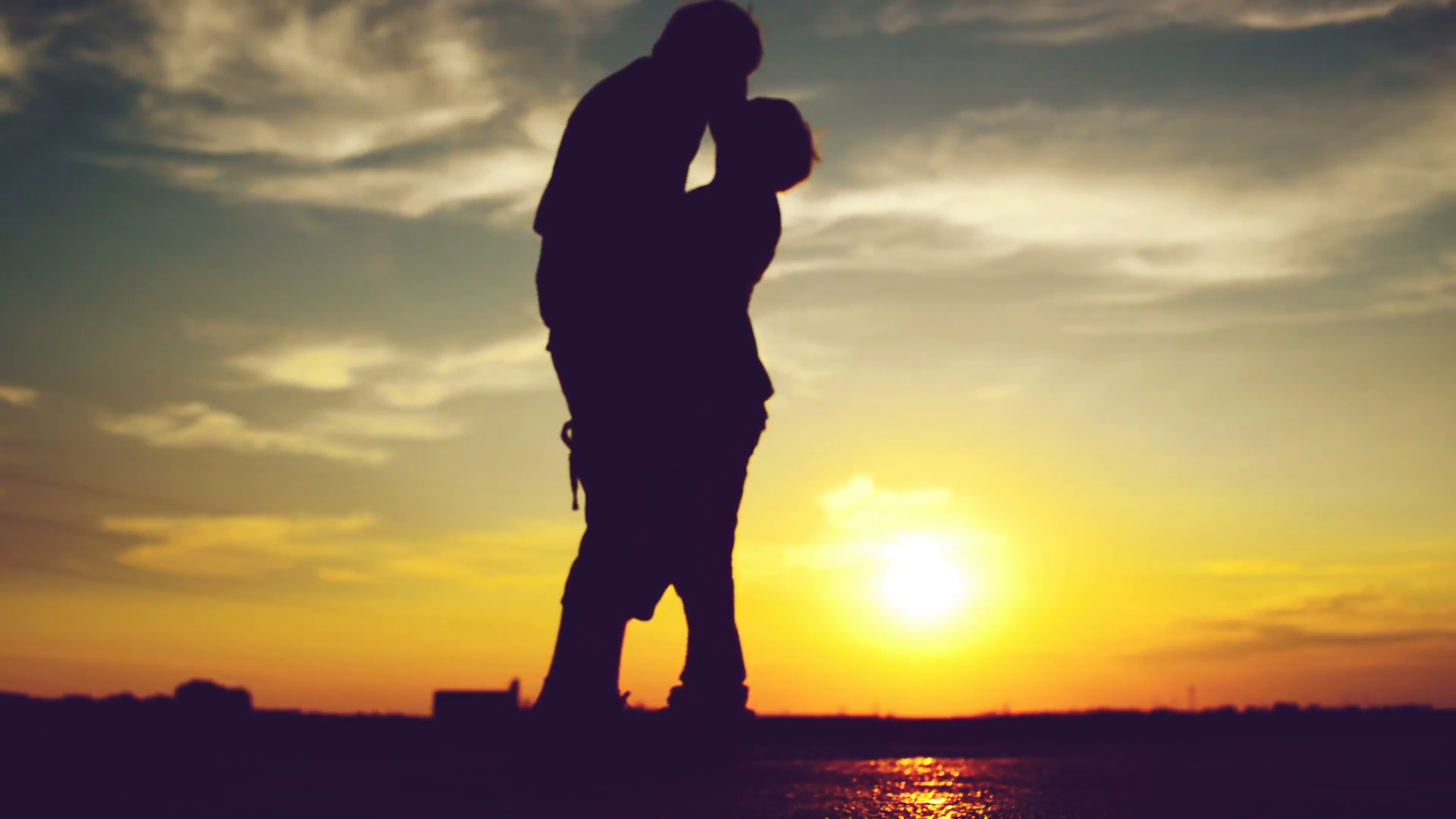 Lovers on a date in sunset, hugging and kissing. Romantic love scene ...