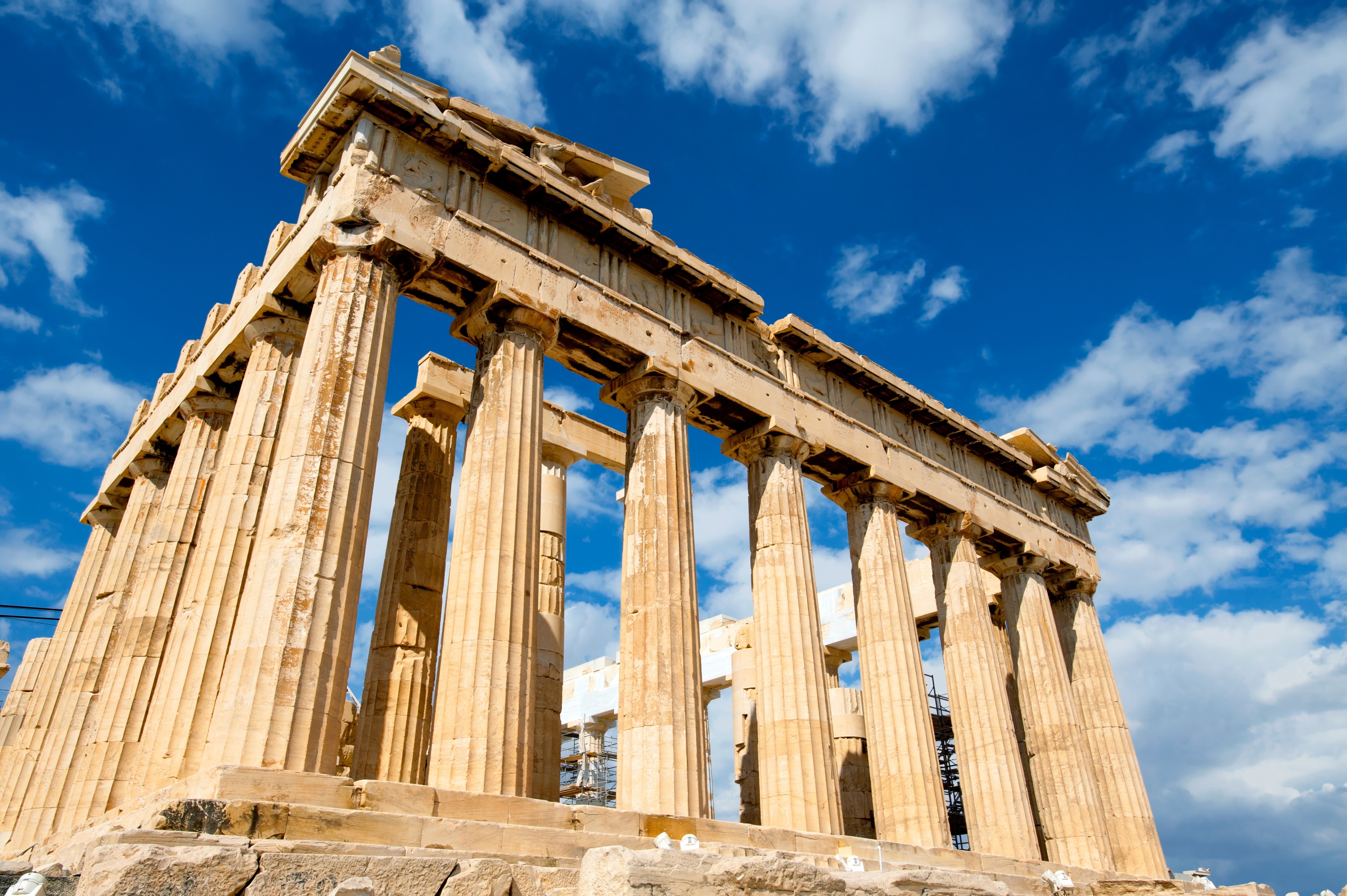 Low angle photograph of the parthenon during daytime