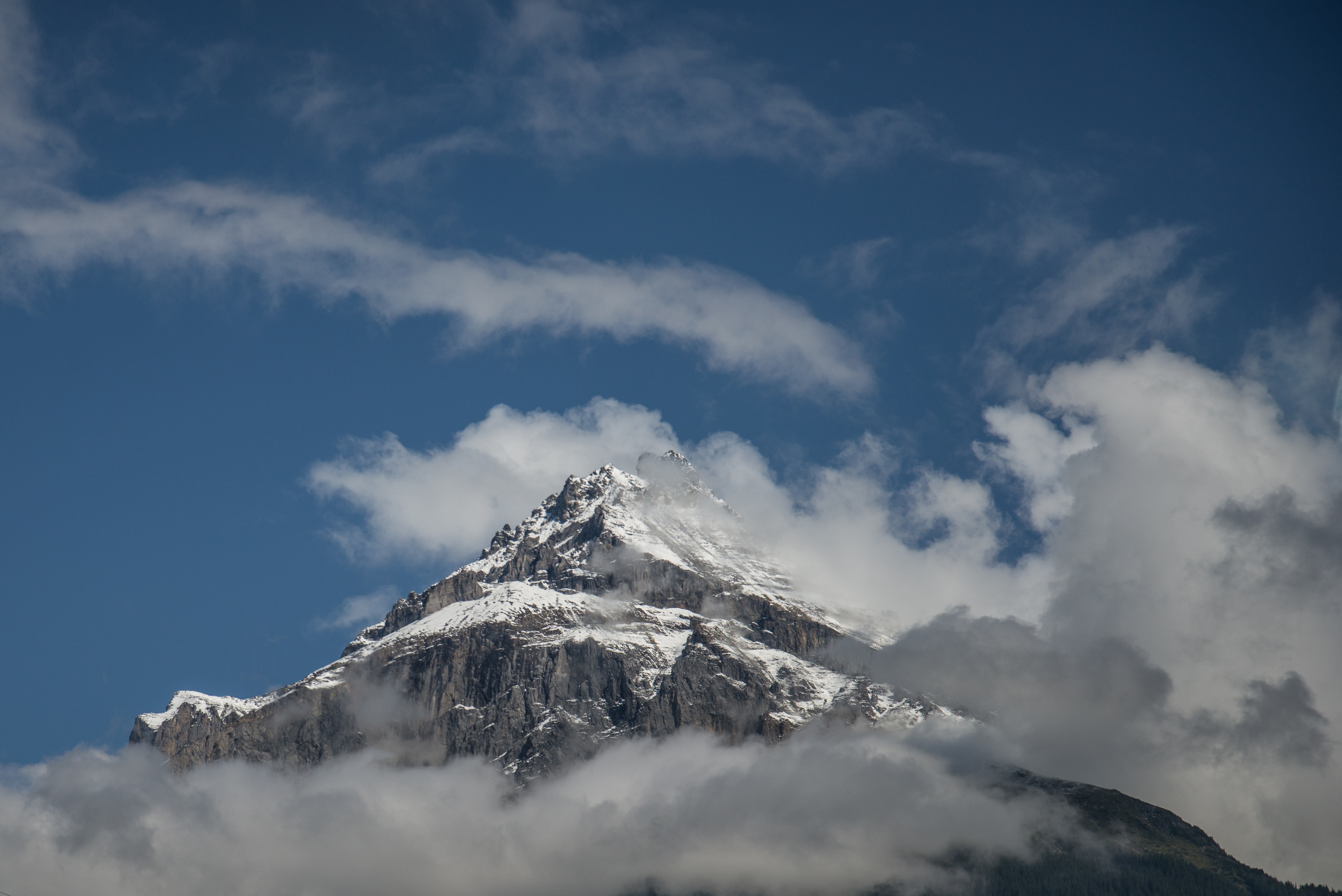 Low angle photography of mount everest under blue sky