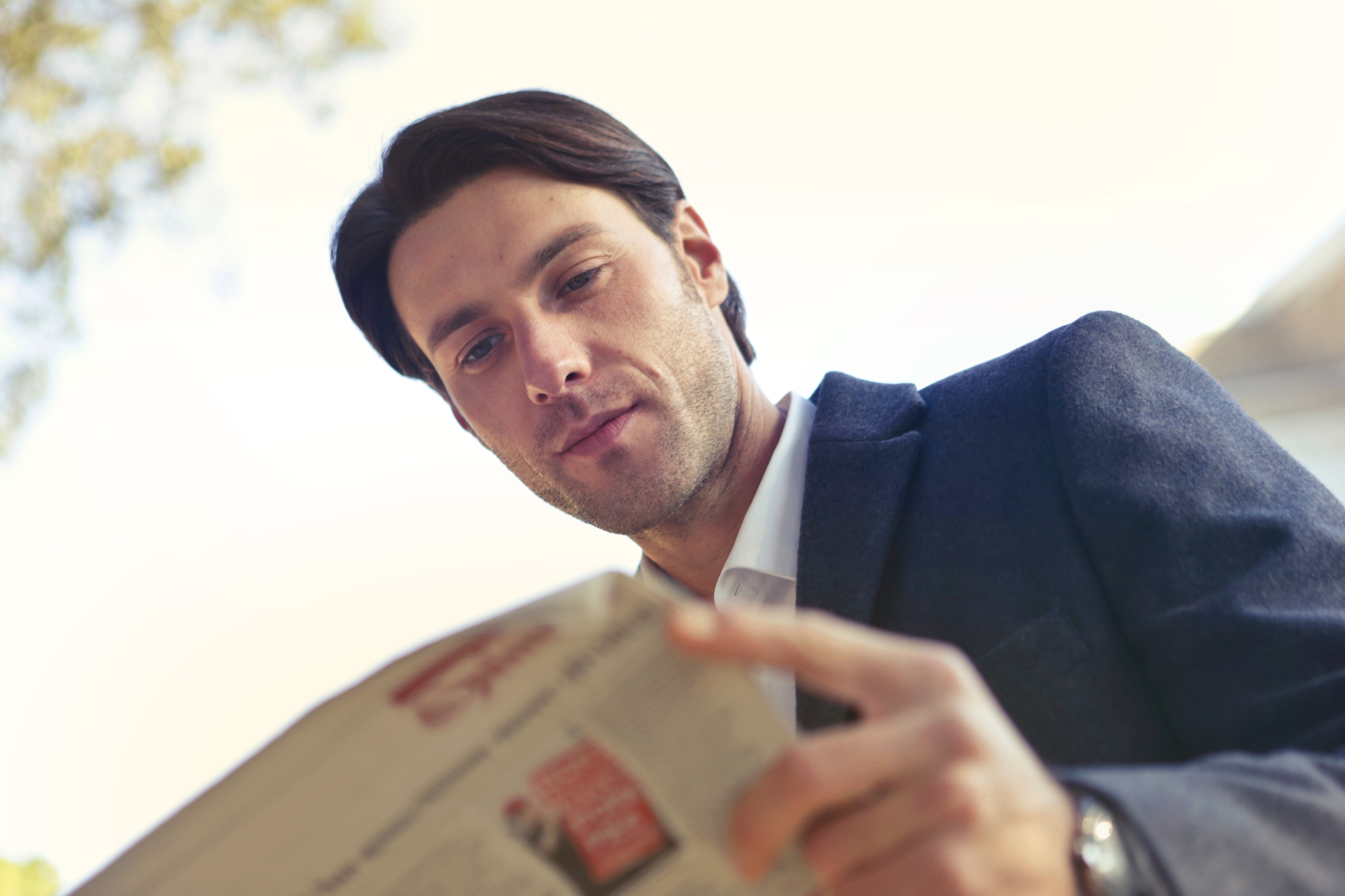 Low Angle Shot of Man Reading Newspaper, Looking, Wear, Success, Sit, HQ Photo