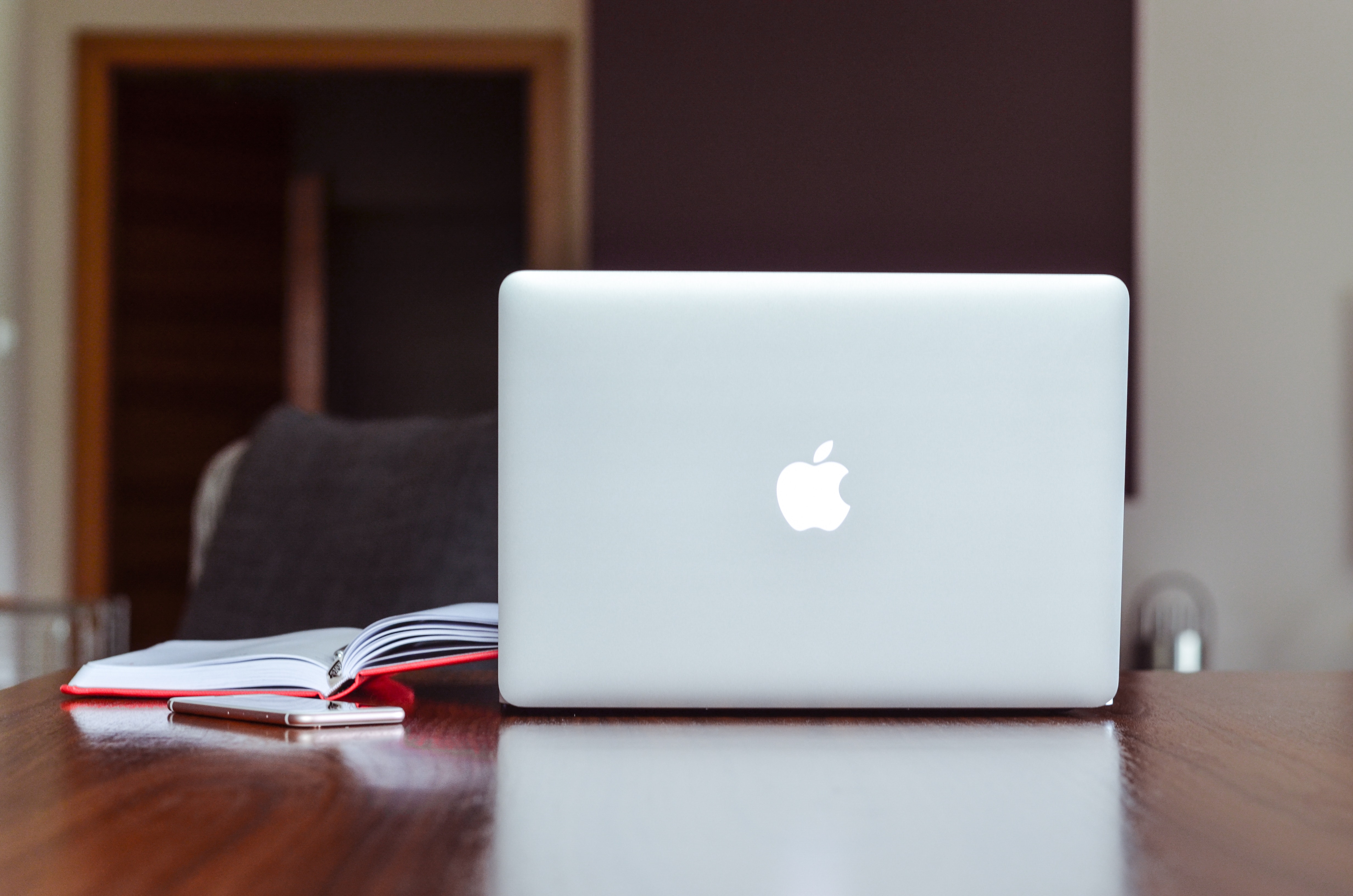 Macbook Air Near Red Book, Logo, Work, Wooden table top, Technology, HQ Photo