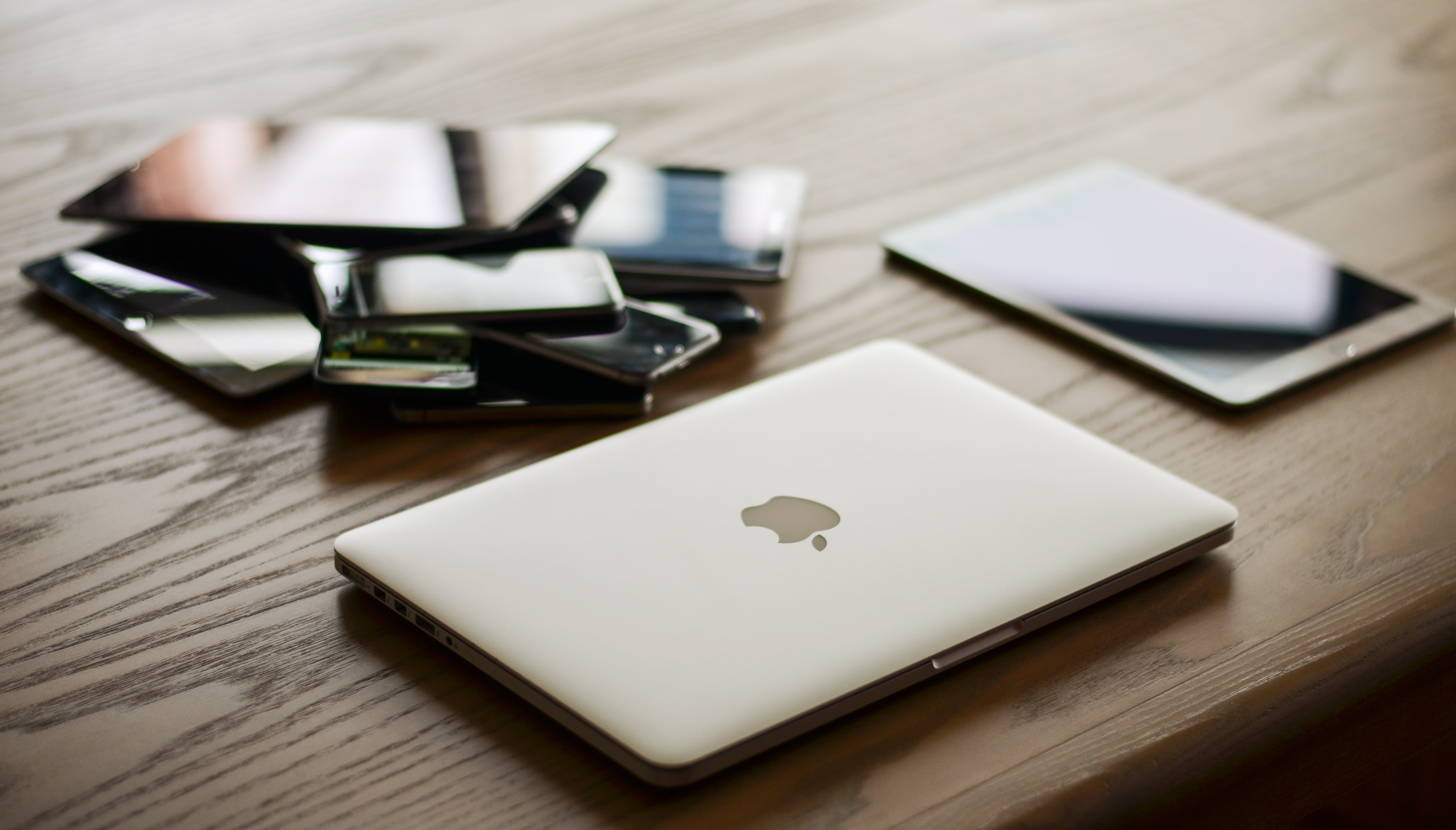 Macbook and ipad on desk photo